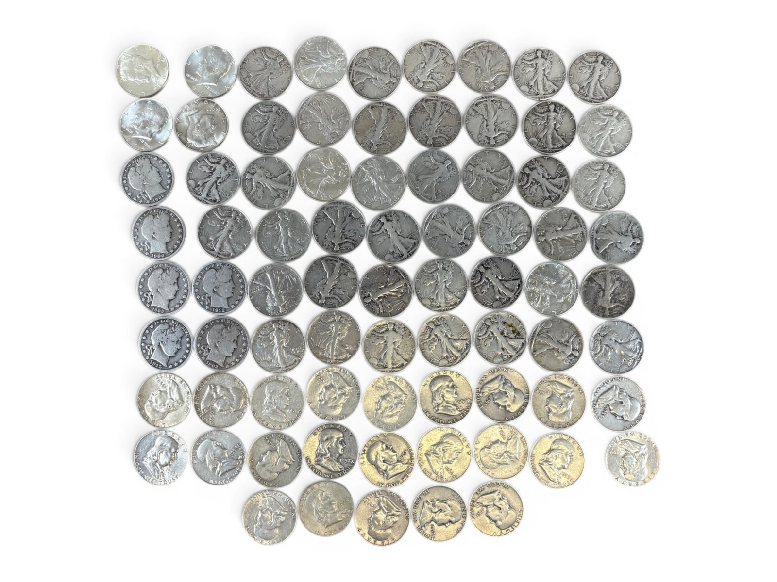 (77) 90% Silver Half Dollars: Group of 77 90% silver half dollars including Barber, Walking Liberty, Franklin, and 1964 Kennedy examples. Mixed dates and conditions. Shipping: Weiss Auctions offers full-service, in-house shipping 