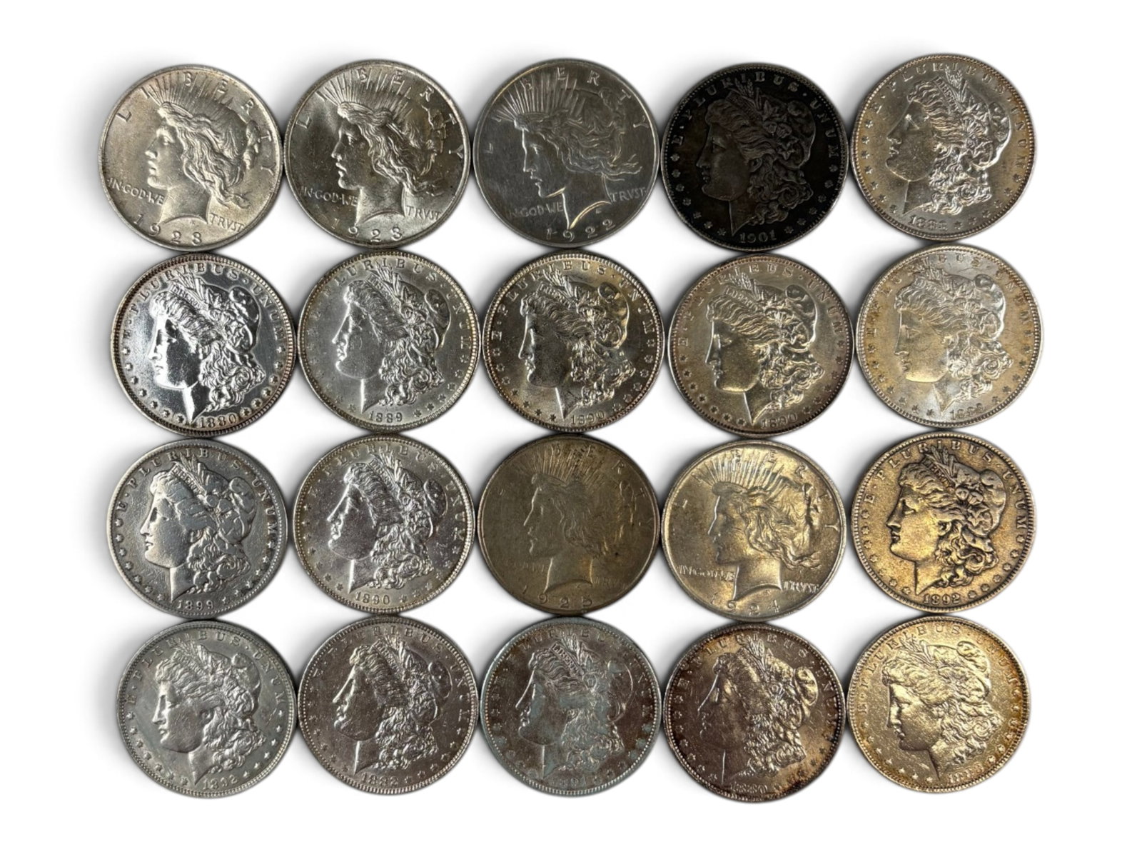 (20) Morgan and Peace Dollars: 20 Morgan and Peace Dollars. Mixed dates and grades. See images. Shipping: Weiss Auctions offers full-service, in-house shipping for nearly all items in this auction. For a shipping quote, please cont