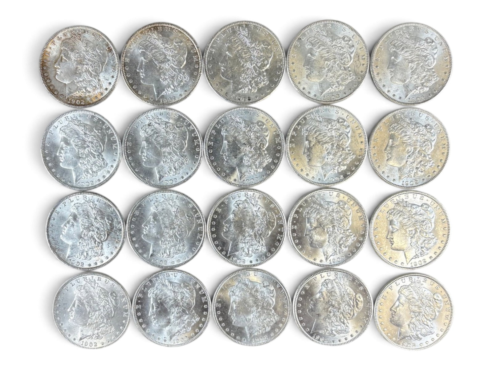 (20) 1902-O Morgan Dollars: 20 High Grade 1902-O Morgan Dollars. See images.This lot is being offered on behalf of the Kings County Public Administrators Office from the Estate of Michael Amodeo (PA#201116) DE8554128. Shipping: 