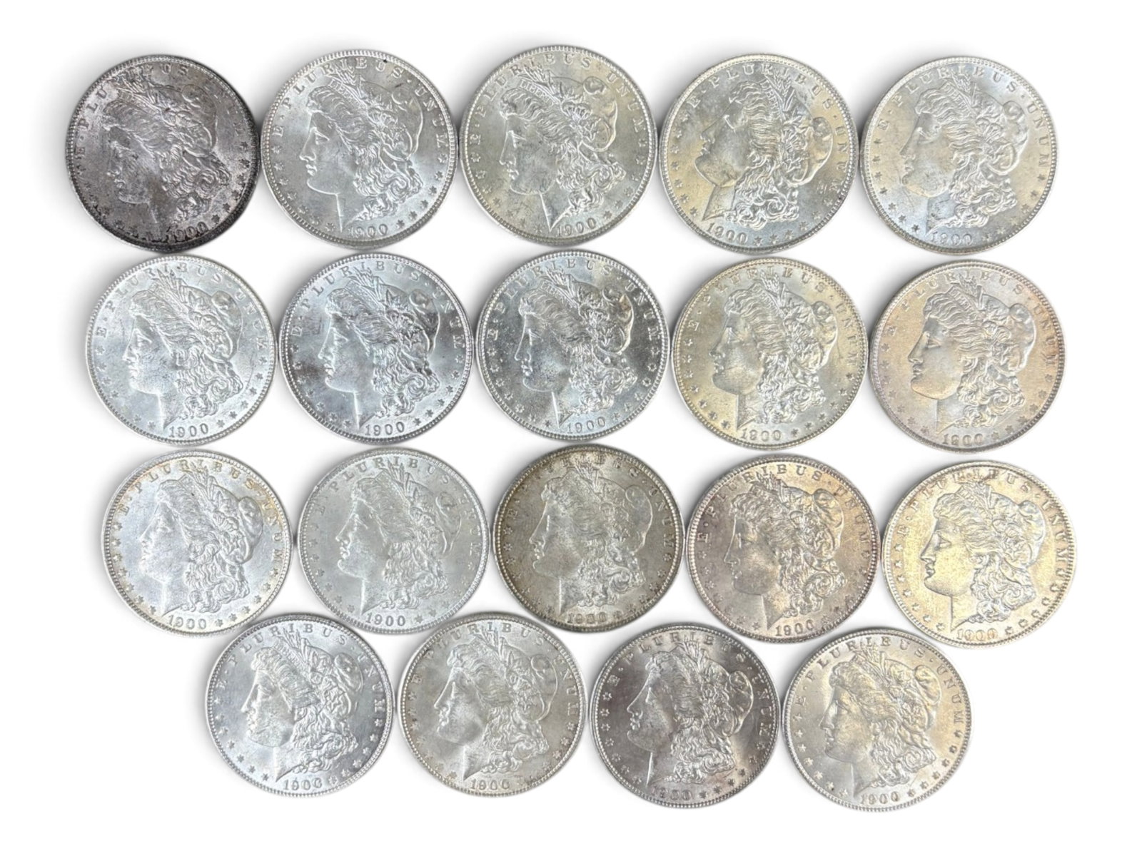 (19) 1900 Morgan Dollars: 19 High Grade 1900 Morgan Dollars. See images.This lot is being offered on behalf of the Kings County Public Administrators Office from the Estate of Michael Amodeo (PA#201116) DE8554128. Shipping:
