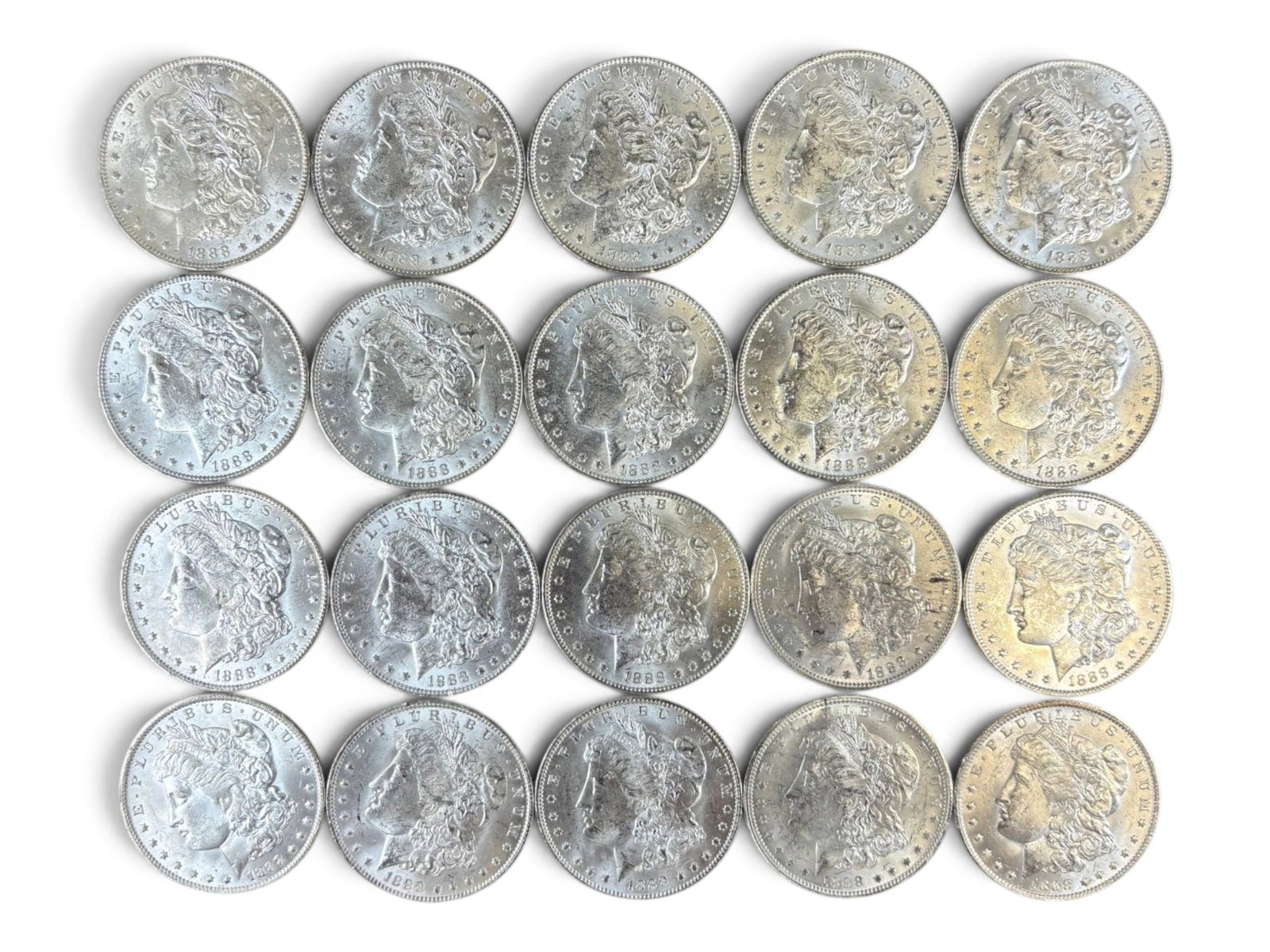 (20) 1888-O Morgan Dollars: 20 High Grade 1888-O Morgan Dollars. See images.This lot is being offered on behalf of the Kings County Public Administrators Office from the Estate of Michael Amodeo (PA#201116) DE8554128. Shipping: