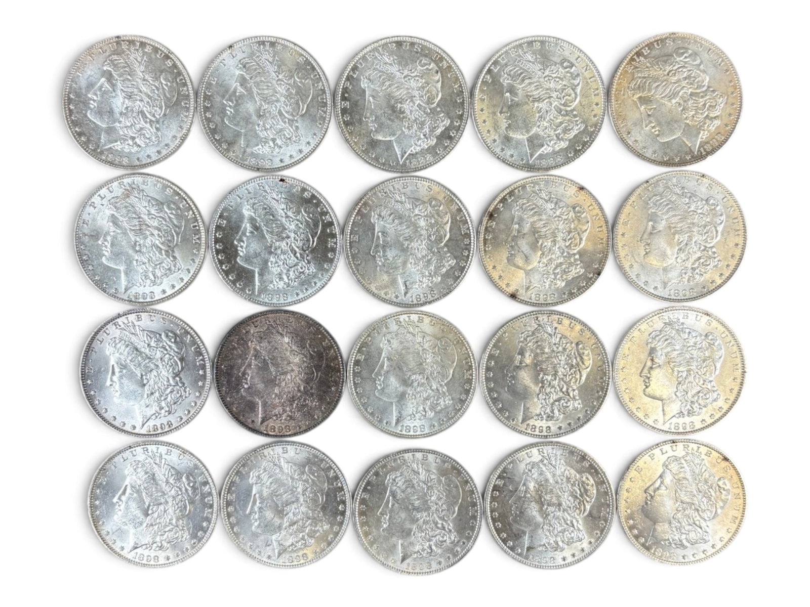 (20) 1898 Morgan Dollars: 20 High Grade 1898 Morgan Dollars. See images.This lot is being offered on behalf of the Kings County Public Administrators Office from the Estate of Michael Amodeo (PA#201116) DE8554128. Shipping: We