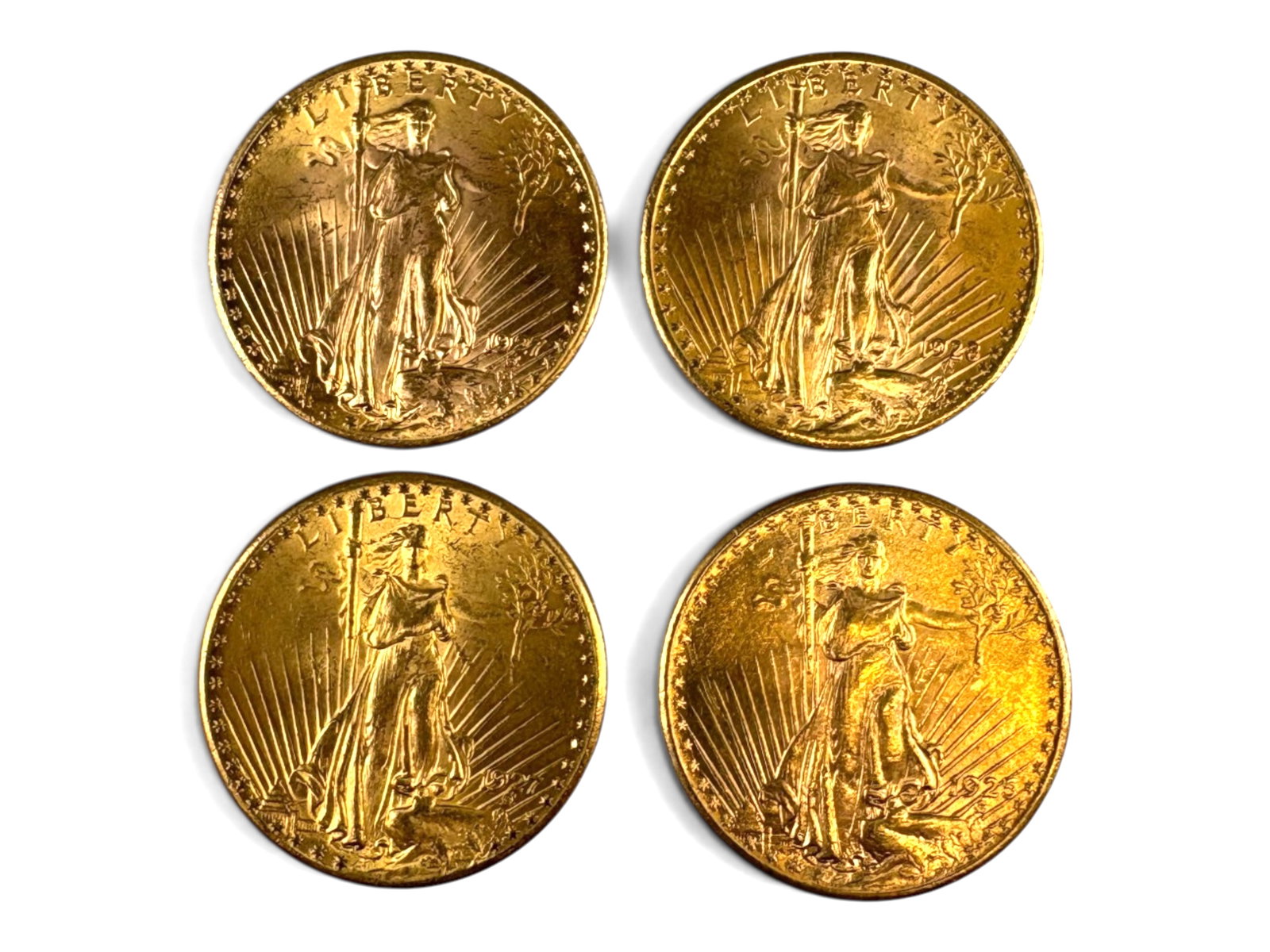 (4) $20 St. Gaudens: 4 $20 Gold St. Gaudens Double Eagles. Mixed dates. See images.This lot is being offered on behalf of the Kings County Public Administrators Office from the Estate of Michael Amodeo (PA#201116)