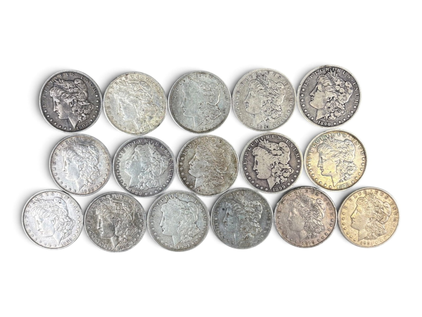(16) Morgan Dollars: 16 Morgan Dollars. Mixed dates and conditions. See images. Shipping: Weiss Auctions offers full-service, in-house shipping for nearly all items in this auction. For a shipping quote, please contact us
