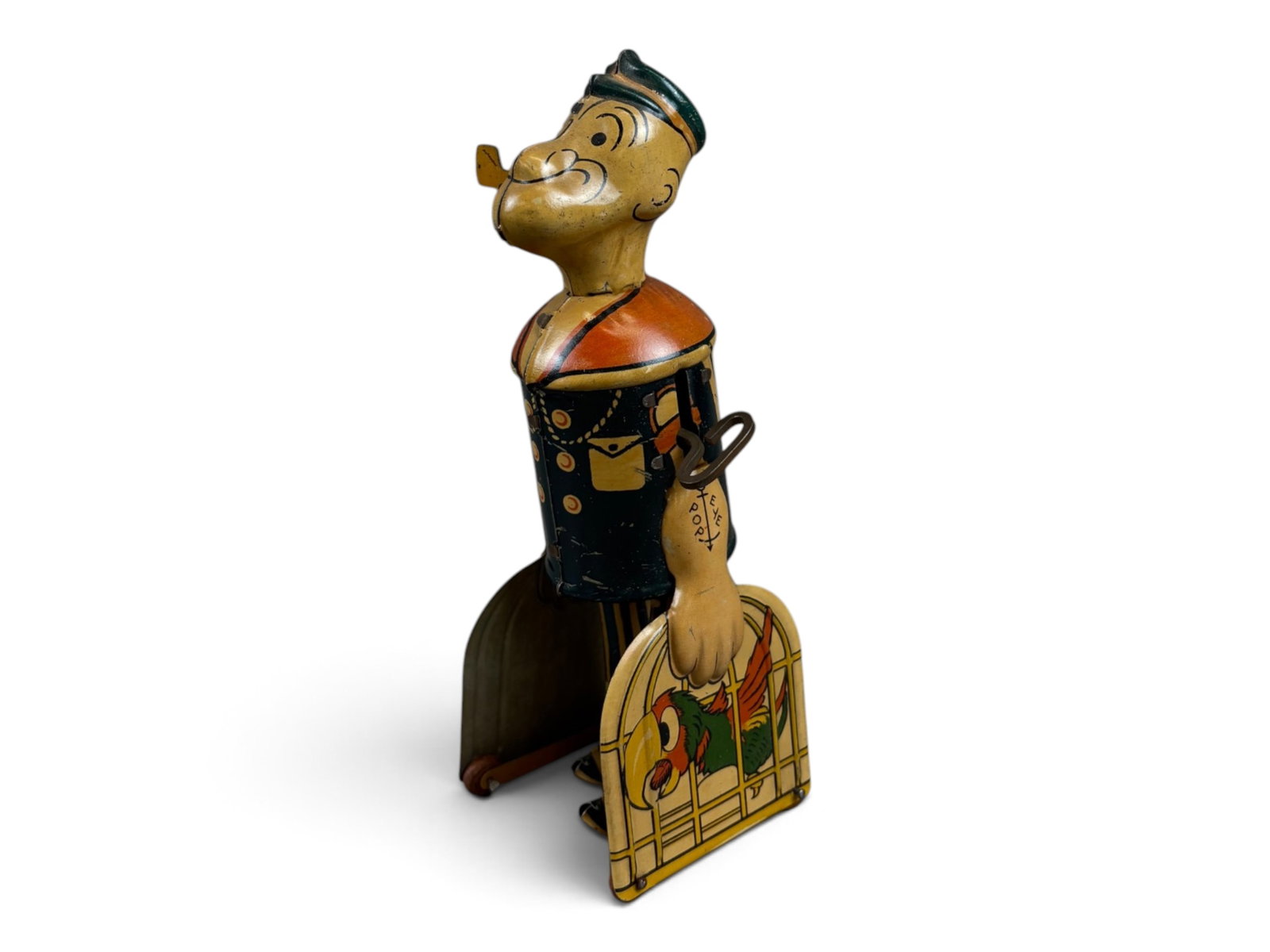 Marx Popeye with Parrot Wind-Up: Marx tin lithographed wind-up "Popeye with Parrot." Vintage mechanical toy in very nice condition with clean, colorful lithography. Tested prior to cataloging and found to be in working order. Shippin