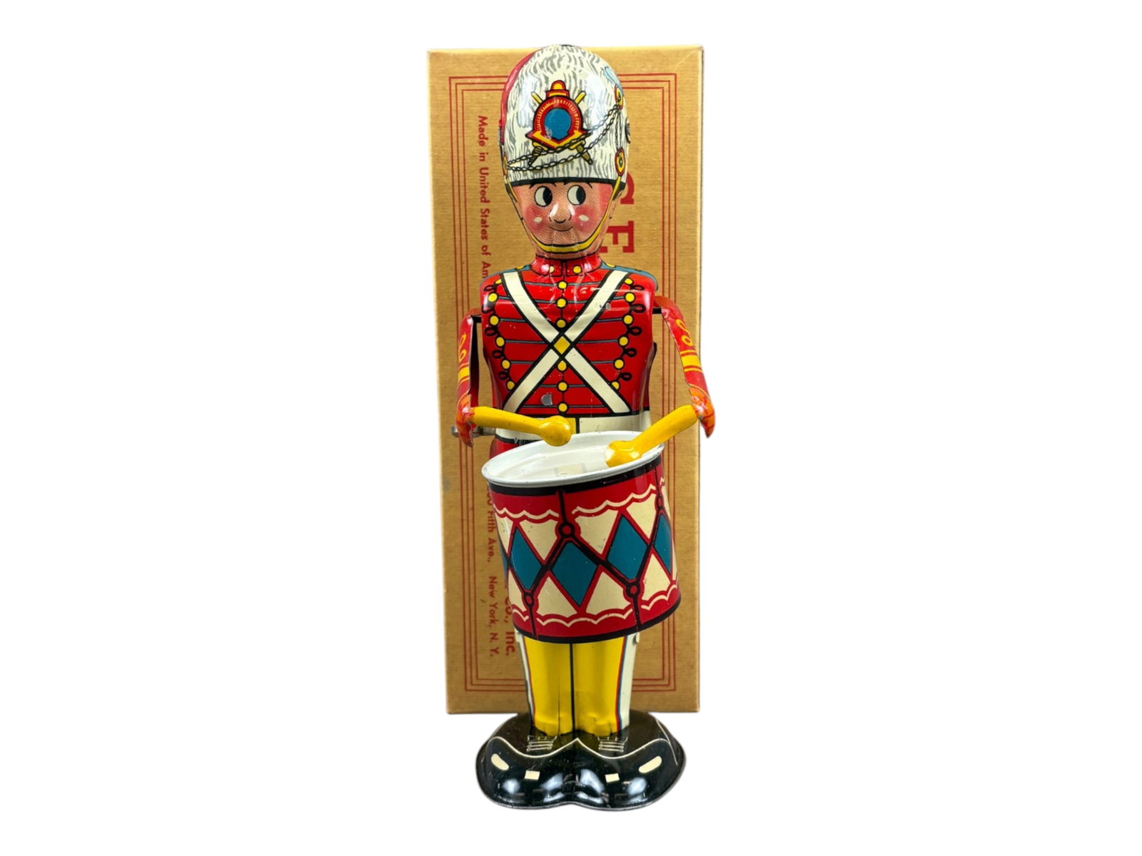 Marx George the Drummer Boy: Marx "George the Drummer Boy" tin lithographed wind-up toy with its original box. Toy is in like-new condition and was tested prior to cataloging, with the wind-up mechanism operating perfectly. An