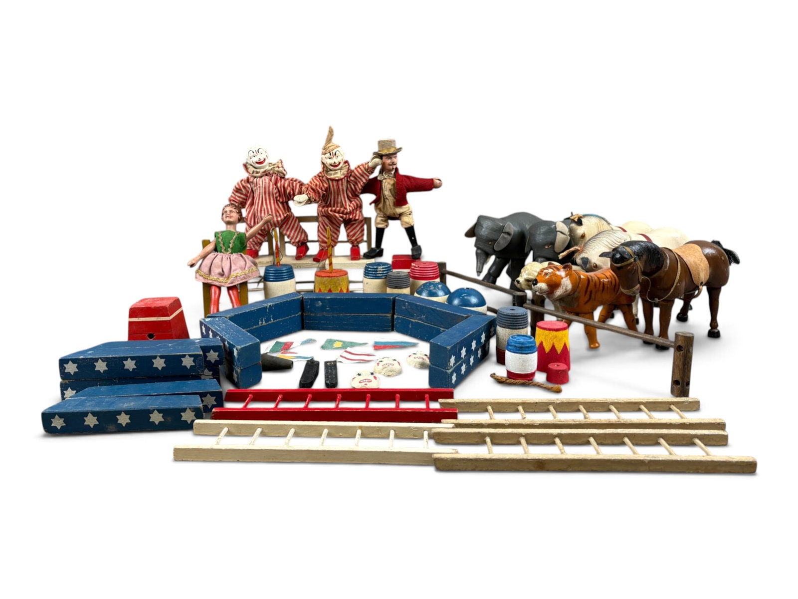 Schoenhut Circus Group: Terrific lot of reduced-size Schoenhut circus animals, figures, and accessories. Includes three horses (two white and one brown), a reduced-size poodle, tiger, and two elephants, along with a