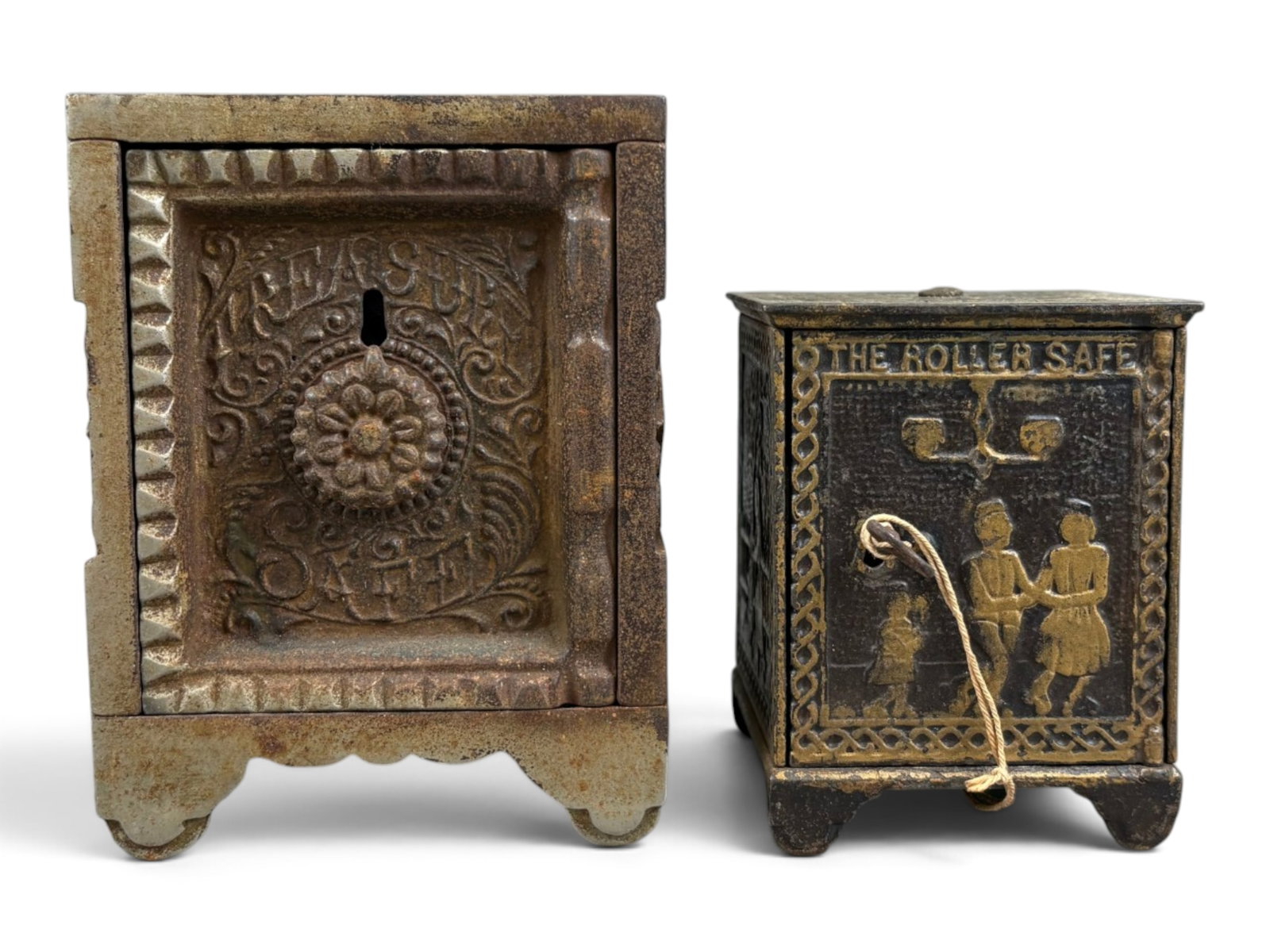 (2) Cast Iron Safe Banks: Lot of two cast iron still banks. Includes a 3?-inch-tall Roller Safe bank with excellent graphics, original gilt paint, and its working key, along with a 5-inch-tall J. & E. Stevens Treasure Safe
