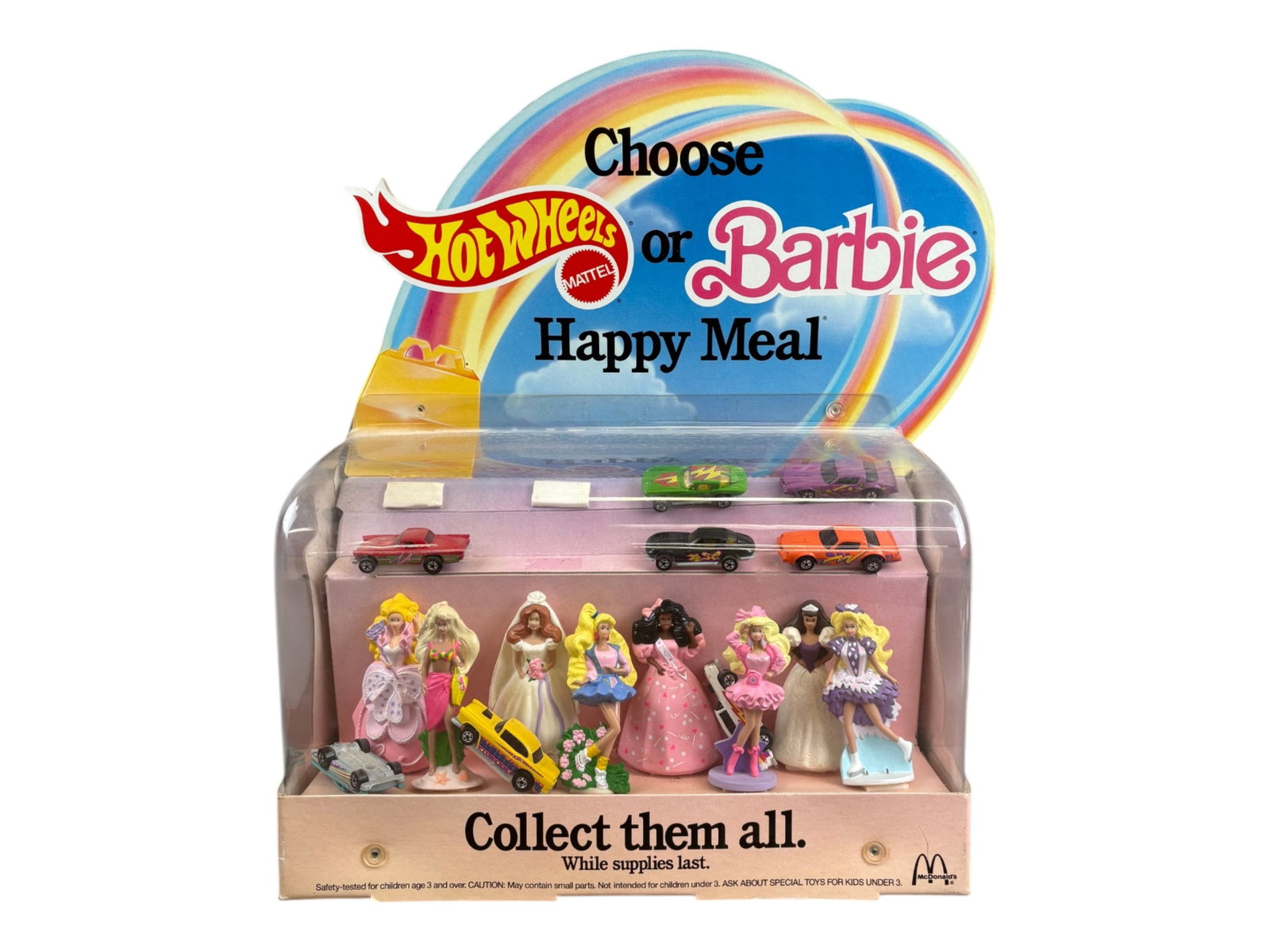 McDonald's Hotwheels & Barbie Happy Meal Display: Original 1991 McDonald's Happy Meal Toy Display for Hot Wheels and Barbies. Includes (8) Hot Wheels (3 have shifted inside), and (8) Barbie figurines. Overall approx. 15.5" x 20". Cardboard and