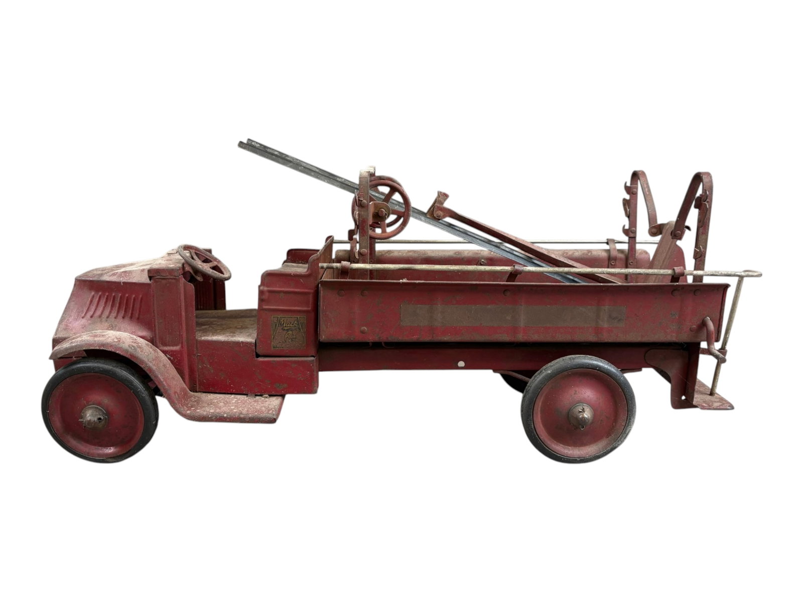 Steelcraft City Fire Dept Pressed Steel Truck: Large vintage Steelcraft City Fire Department pressed steel fire truck in original red painted finish. Features open cab with steering wheel, and steel disc wheels with rubber tires. Retains Mack