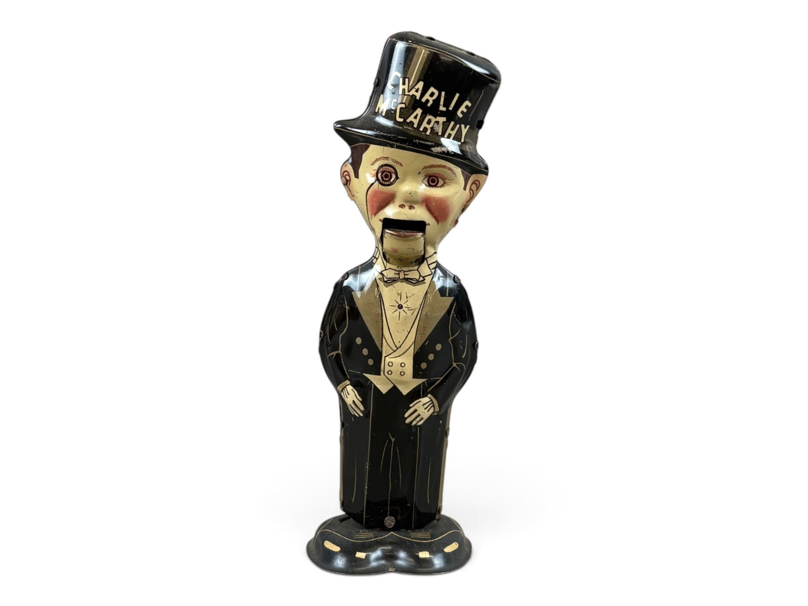 Marx Charlie McCarthy Walker: Marx tin lithographed Charlie McCarthy wind-up walker measuring approximately 8 inches tall. Tested prior to cataloging and found to be in working order. A fine example of this classic Marx