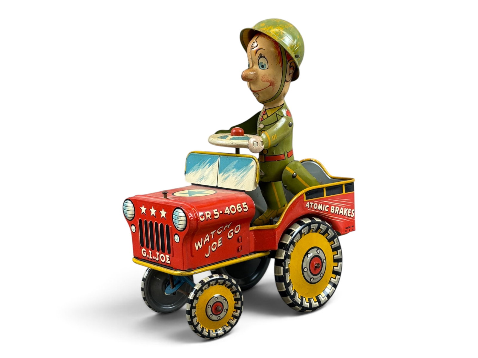 Unique Art G.I. Joe Jousting Jeep: Unique Art Manufacturing Company "G.I. Joe Jousting Jeep" tin lithographed wind-up toy measuring approximately 8? inches long. Toy is in very fine to near mint condition and was tested prior to