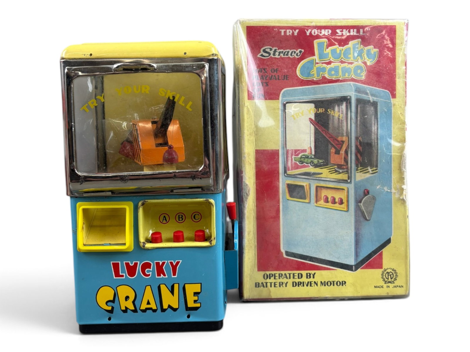 Straco Lucky Crane: Straco battery-operated "Lucky Crane" with its original box. Tested prior to cataloging and found not to be in working order. The toy has been in storage for nearly 40 years and may simply require