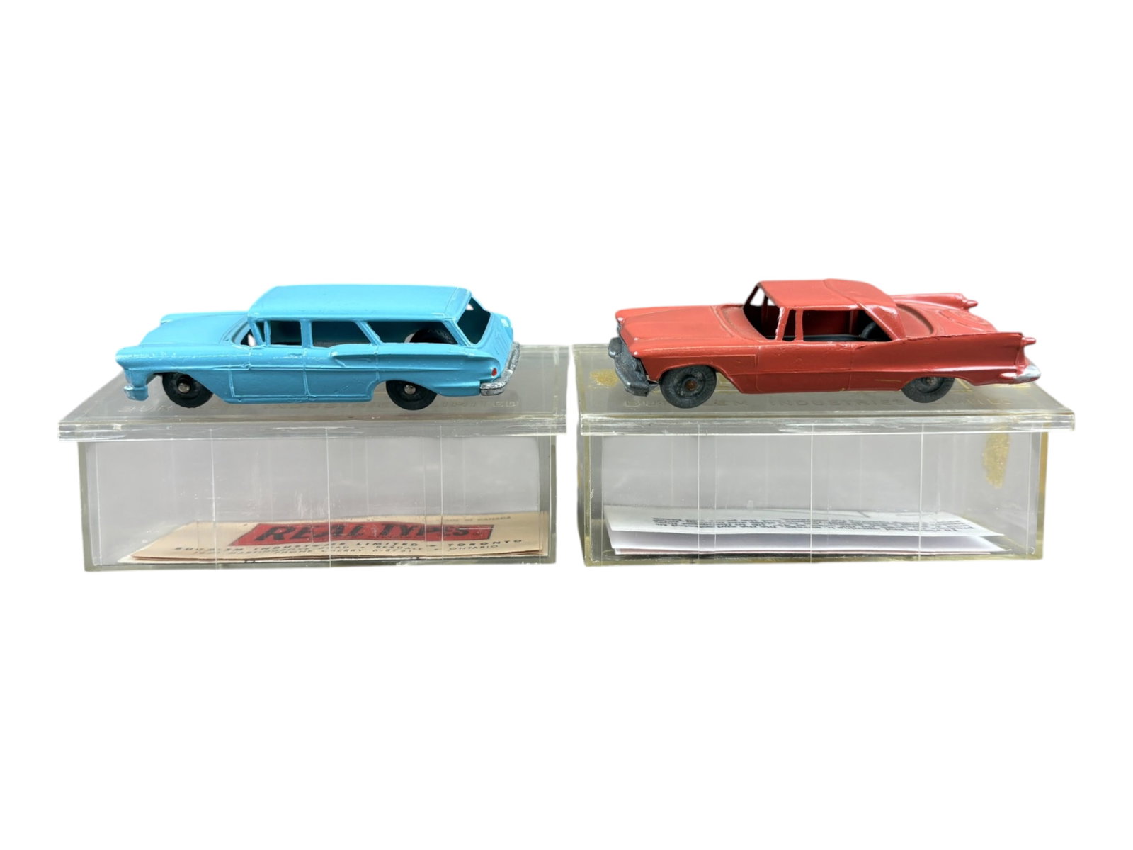 2 Scarce Boxed Hubley Real Toy Canadian Vehicles: Hubley manufactured a few Real Toys in Canada and vehicles are thus marked. Includes a 423 Chrysler 1958 Imperial, salmon; 552(?) 1958 Chevy Yeoman Wagon, lt blue. Both have metal wheels, and