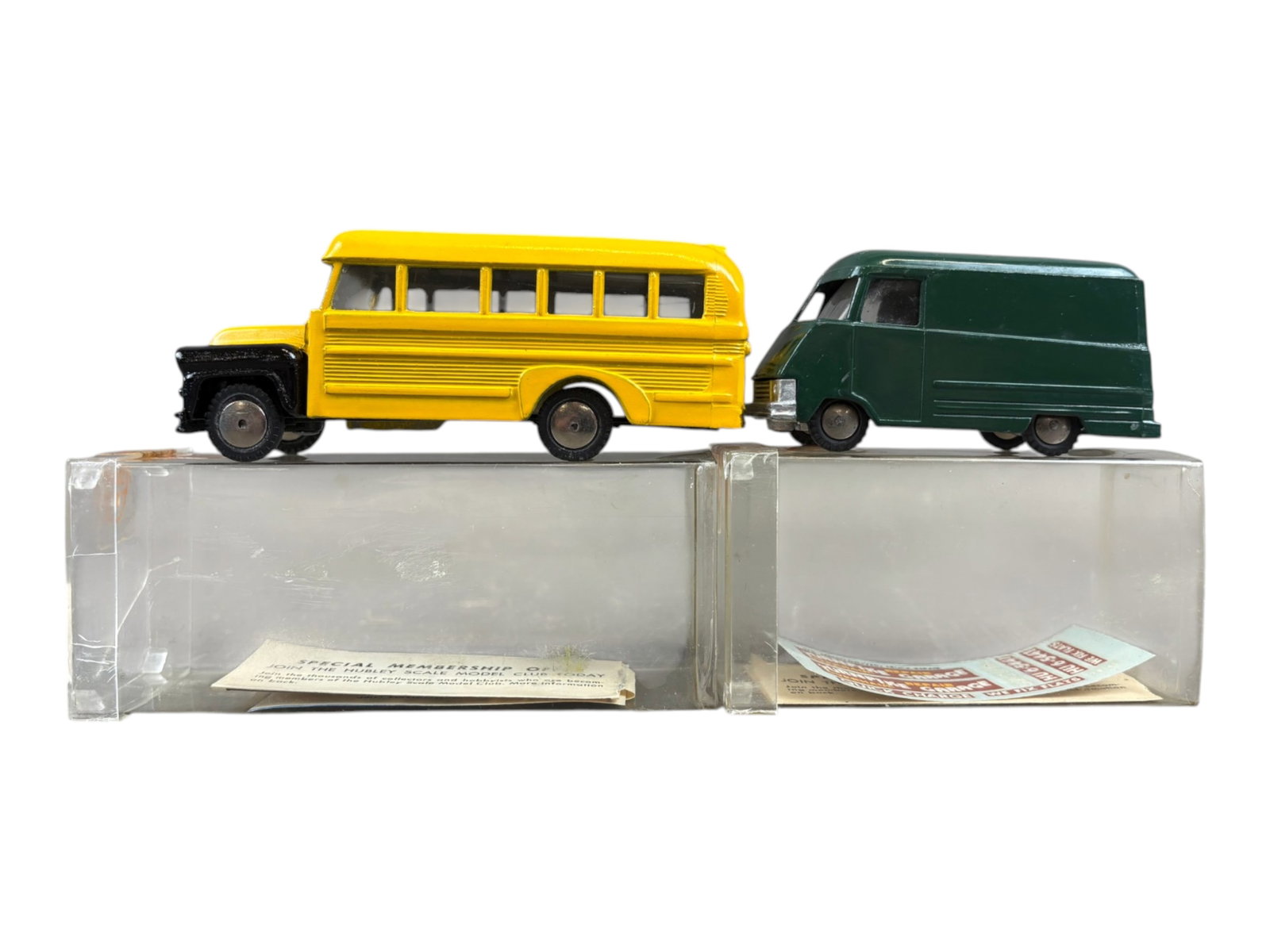 2 LN Boxed Hubley Real Toy Commercial Vehicles: Includes a 736 School Bus; 575 1962 Metro Van Delivery Truck. Both include decal sheets and club paper and are LN in clear plastic boxes. Shipping: Weiss Auctions offers full-service, in-house