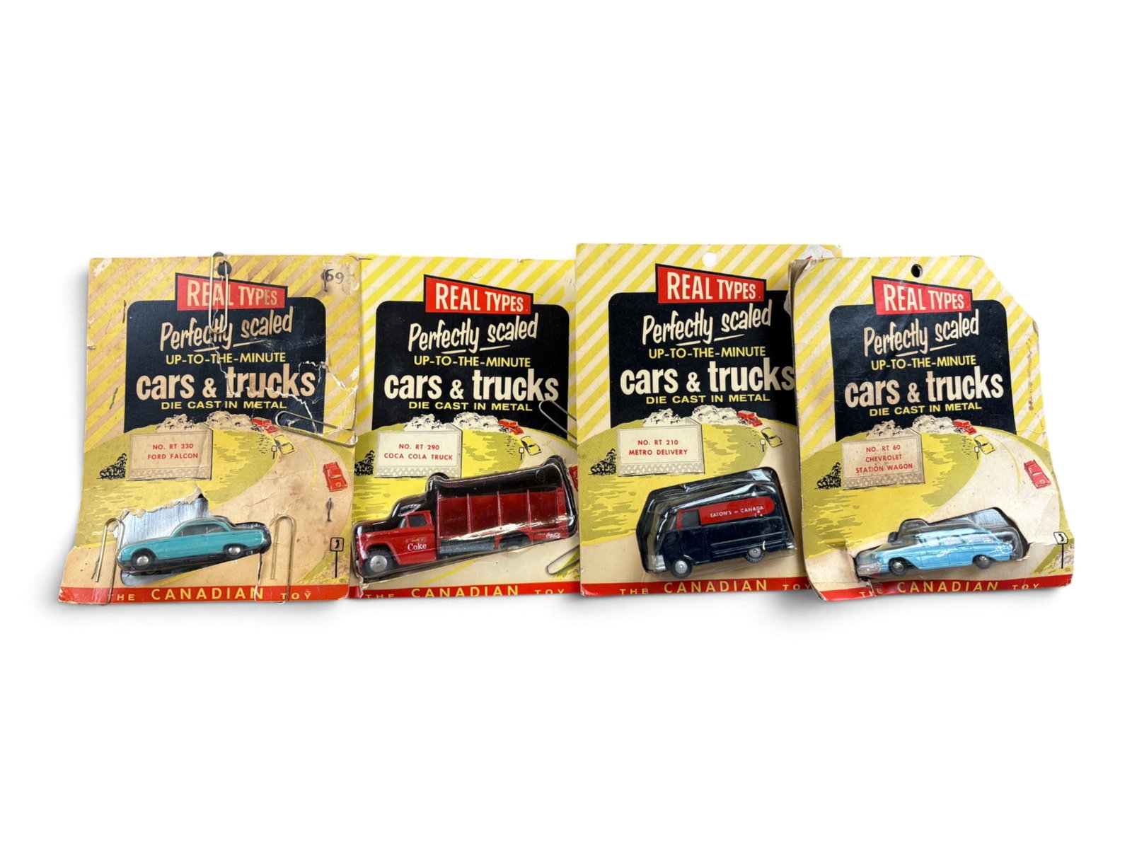 4 Scarce Hubley Real Toy Canadian Carded: includes RT 60 Chevy Wagon; RT330 Ford Falcon; Rt 210 Metro Delivery ?Eaton?s of Canada?, Nice card; RT 290 Coca-Cola delivery. All vehicles are like new, rest of cards are worn, all RE Packaged.