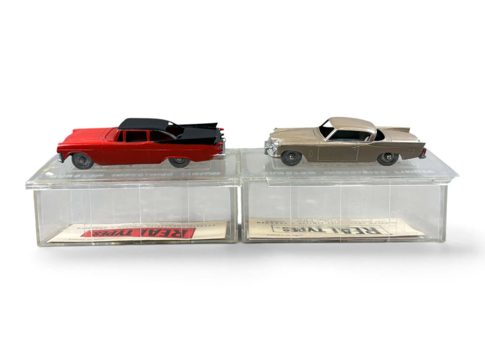 2 Scarce Boxed Hubley Real Toy Canadian Vehicles: Hubley manufactured a few Real Toys in Canada and vehicles are thus marked. Includes a 10 two-tone 1959 Dodge Royal Custom; 50 Studebaker Golden Hawk, platinum. Both have metal wheels, and Canadian