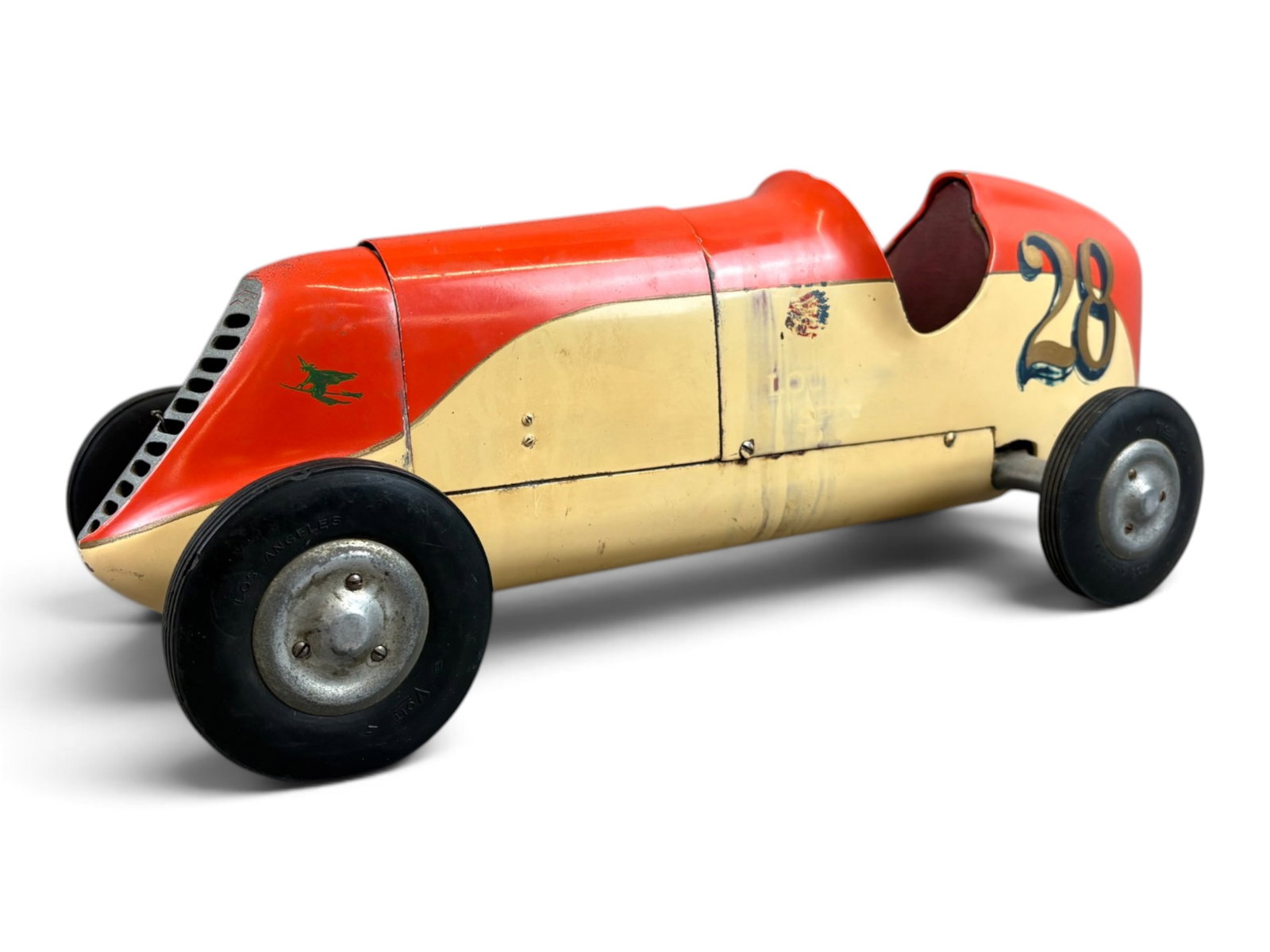 Scarce 1941 Duesenberg Grand Prix Tether Car: Original Owner Piece! Shaped metal, gas powered with rubber tires, 21? long. Removable hood shows an ?OK? gas motor with fuel tank and transmission. It is fairly clean with some wear to number?s drop