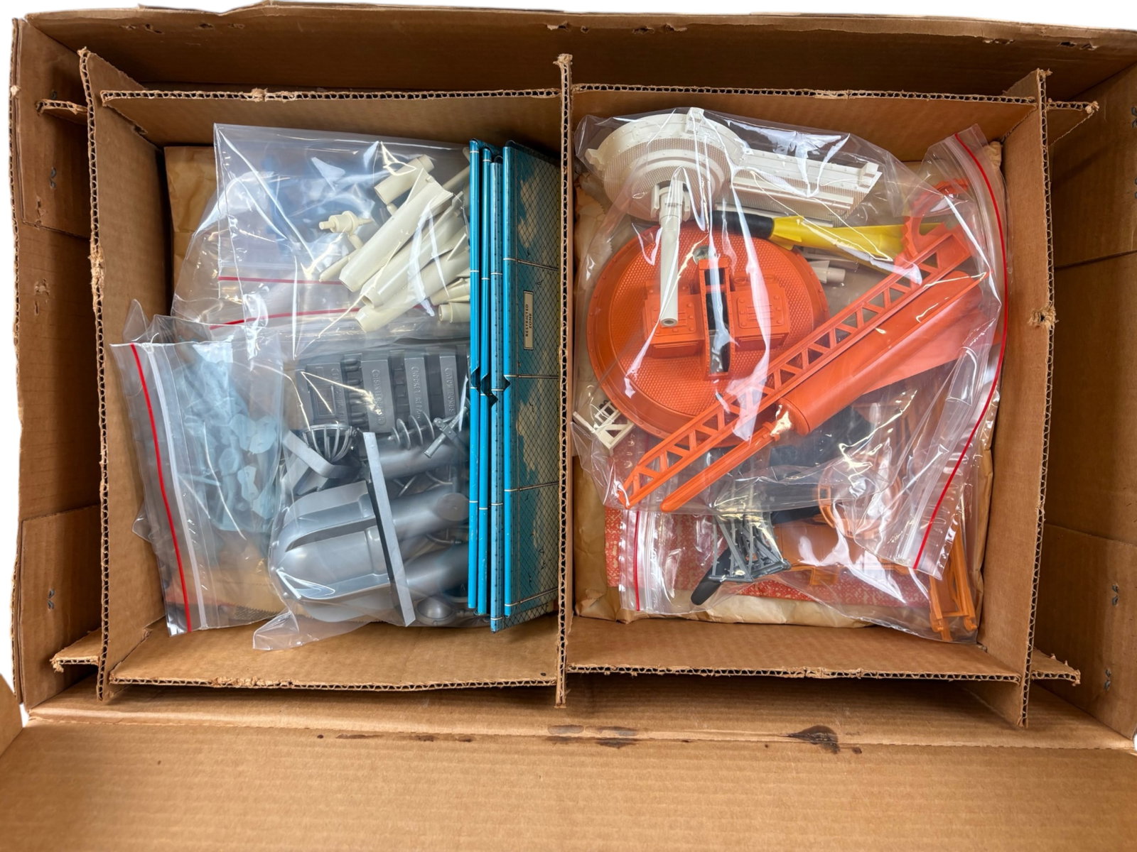 Nice Marx Cape Canaveral Play Set: 1958. Very nice set with all pieces appearing clean and separated in plastic bags. Metal parts are in great shape, appears never built-up. It has its unused decal sheet, instructions and most of the