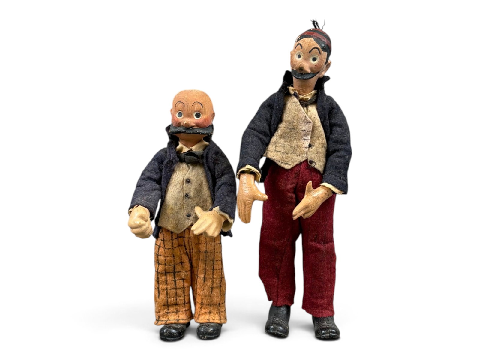 Rare Bucherer Saba Mutt & Jeff Character Figures: SABA, Bucherer & Cie of Amriswil, Switzerland, circa 1920's. Patented metal ball jointed body with hand painted composition head, hands and molded feet. Mutt is approx. 7-5/8" tall, and Jeff approx. 6