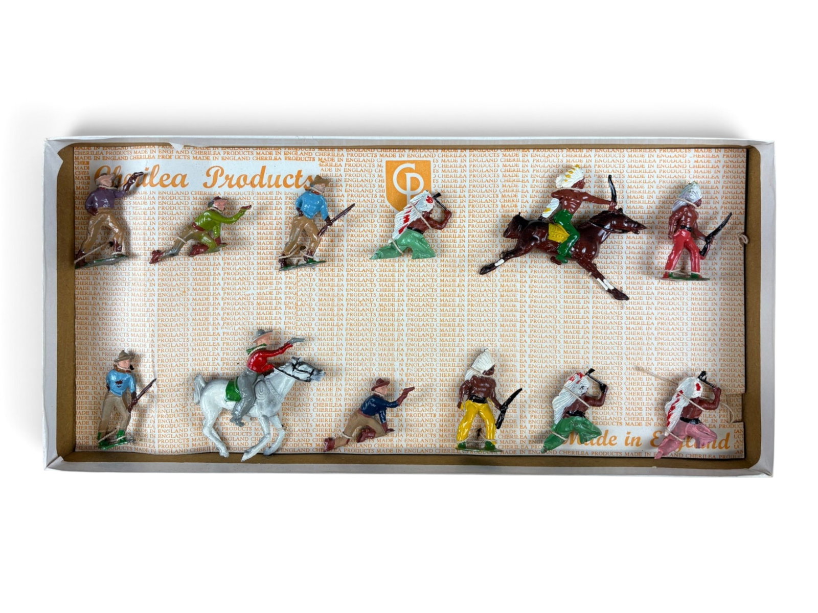 Cherilea Cowboys & Indians Set 72-03: Cherilea Cowboys and Indians Set No. 72-03, a 12-piece set in its original box. Figures remain tied into the original packaging and are mint, including mounted figures. An excellent original boxed exa