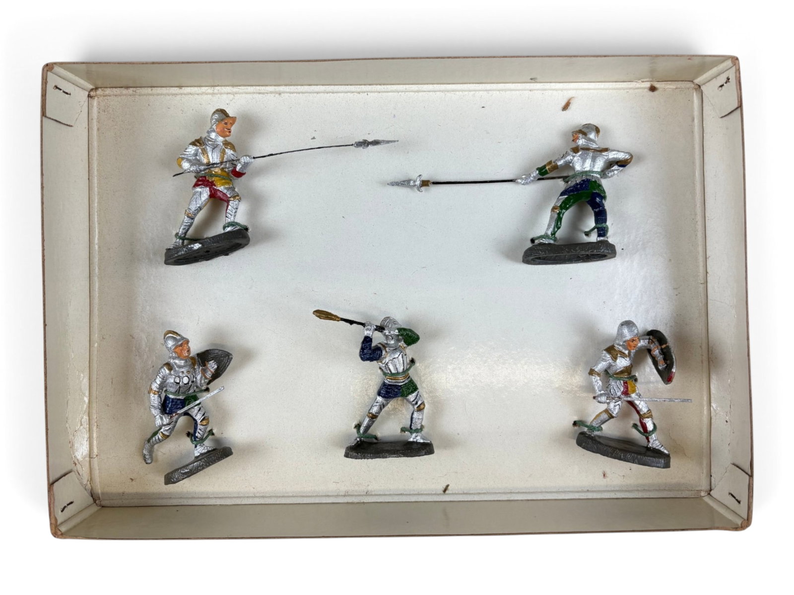 Elastolin (5) Knights Boxed Set: Elastolin five-piece Knights set in its original box. Figures remain tied into the original packaging and are in excellent condition. A very nice original boxed set. Shipping: Weiss Auctions offers