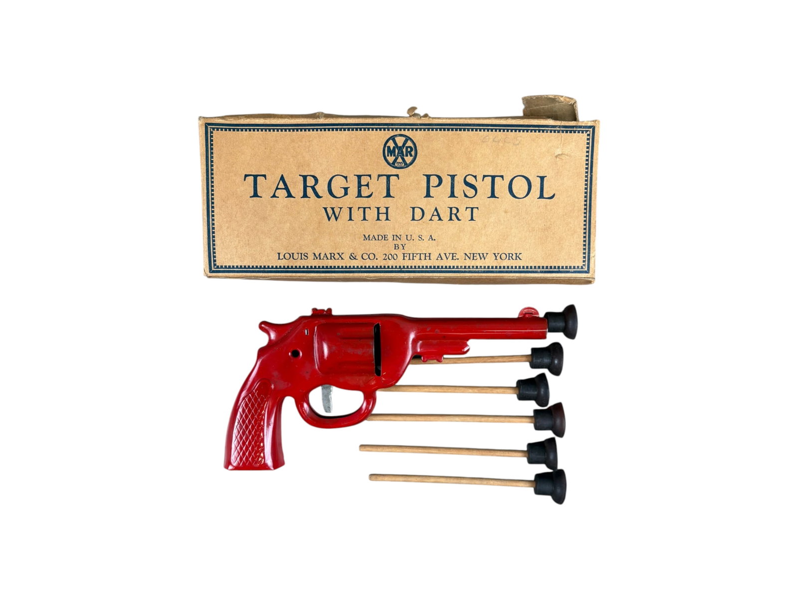 Marx Target Pistol with Darts and Original Box: Red target pistol with 6 rubber tip darts that do not appear to be original. Working condition. Box is a little rough with right side flaps all torn and missing, and other tears and creases.