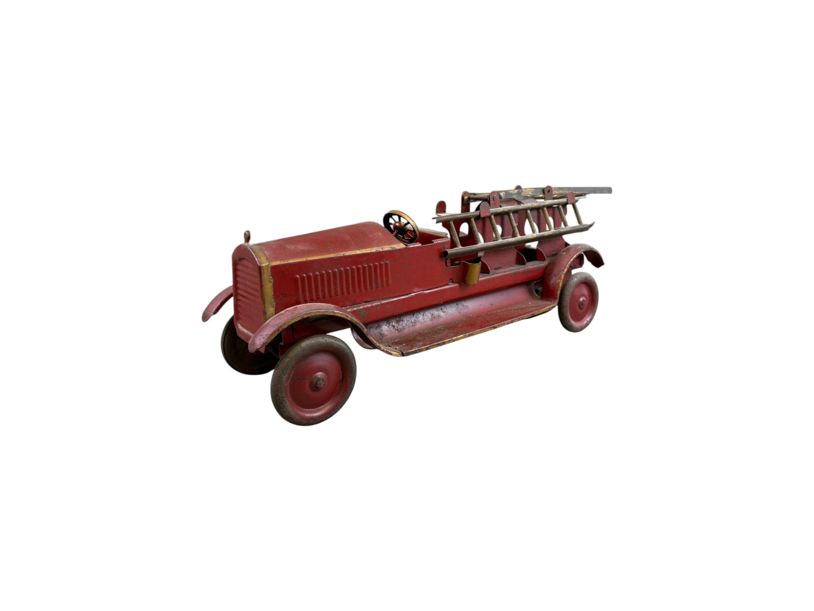 Pressed Steel Hill Climber Fire Truck: Approx. 15" long. Rear wheels with hill climber mechanism are locked and extremely tight. Includes 2 ladders, not sure if original. Shows wear throughout with paint loss, scuffs, and scratches. Sold a
