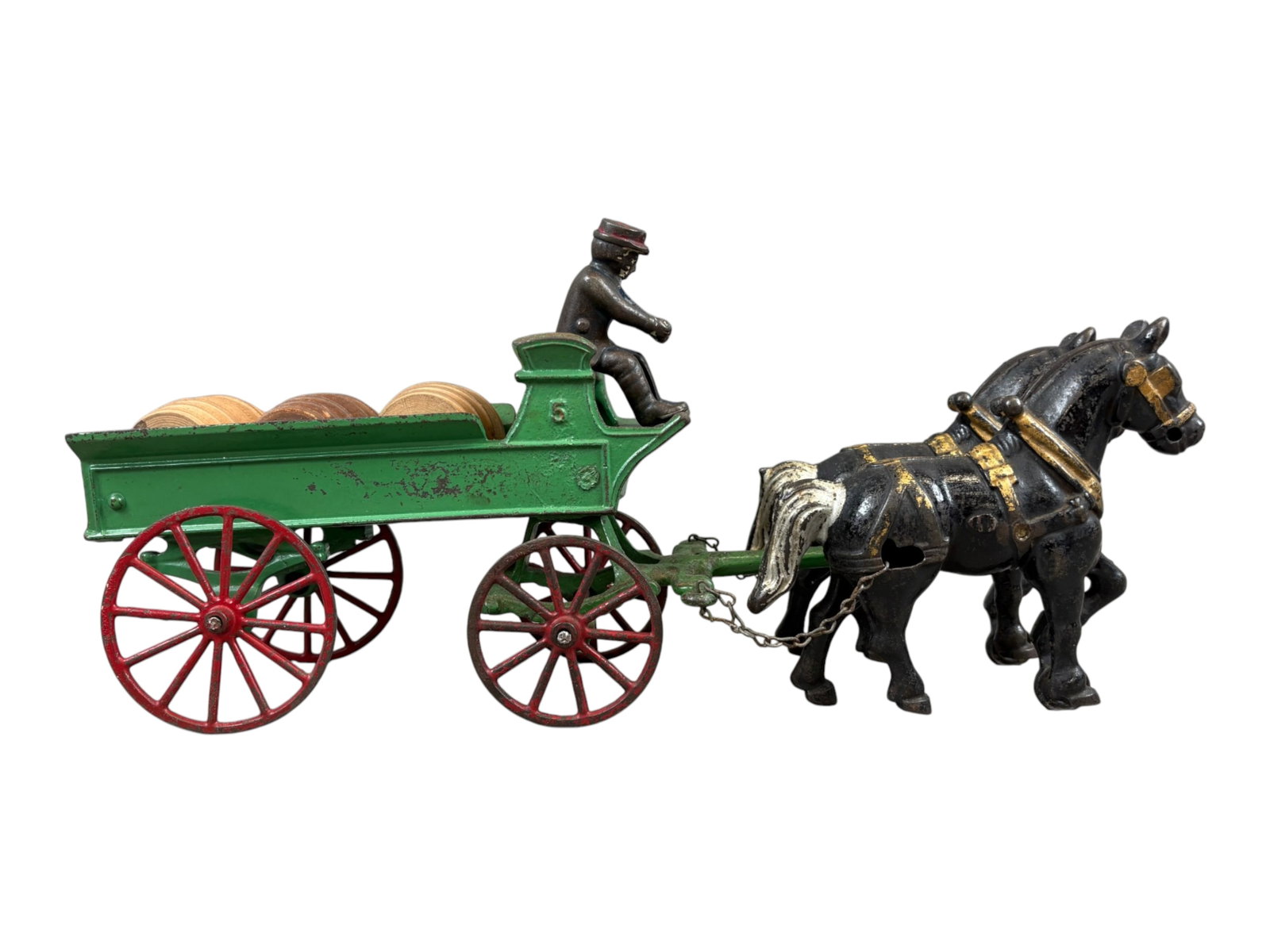 Kenton #5 Cast Iron Horse Drawn Dray w/ 3 Barrels: Overall approx. 14.5" long. 2 Horse drawn team with cast iron driver. Shows playwear with areas of paint loss, scuffs and surface wear. Includes (3) wooden barrels. See images. Shipping: Weiss Auction