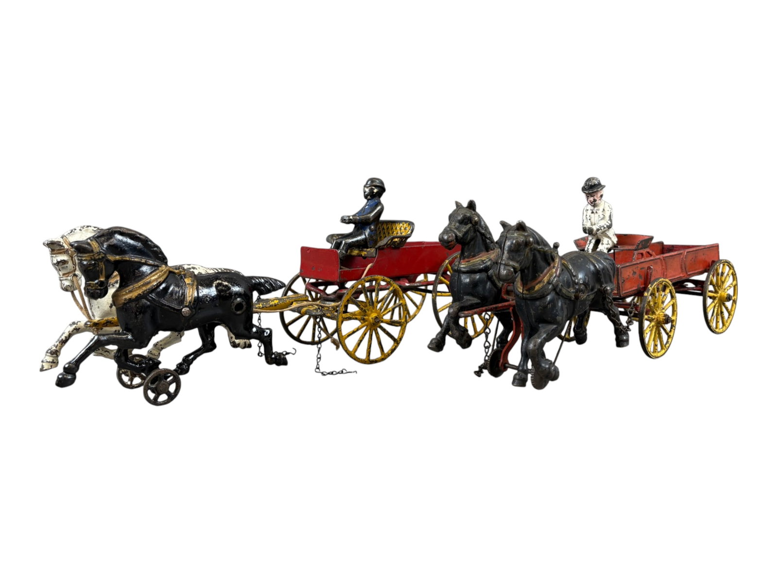 (2) Cast Iron Horse Drawn Wagons: Lot of 2, possibly Kenton/Hubley. Each red wagon features 2 horse drawn team. Drivers do not appear to be original. All pieces show overall playwear with paint loss, scuffs, and surface wear. Overall,