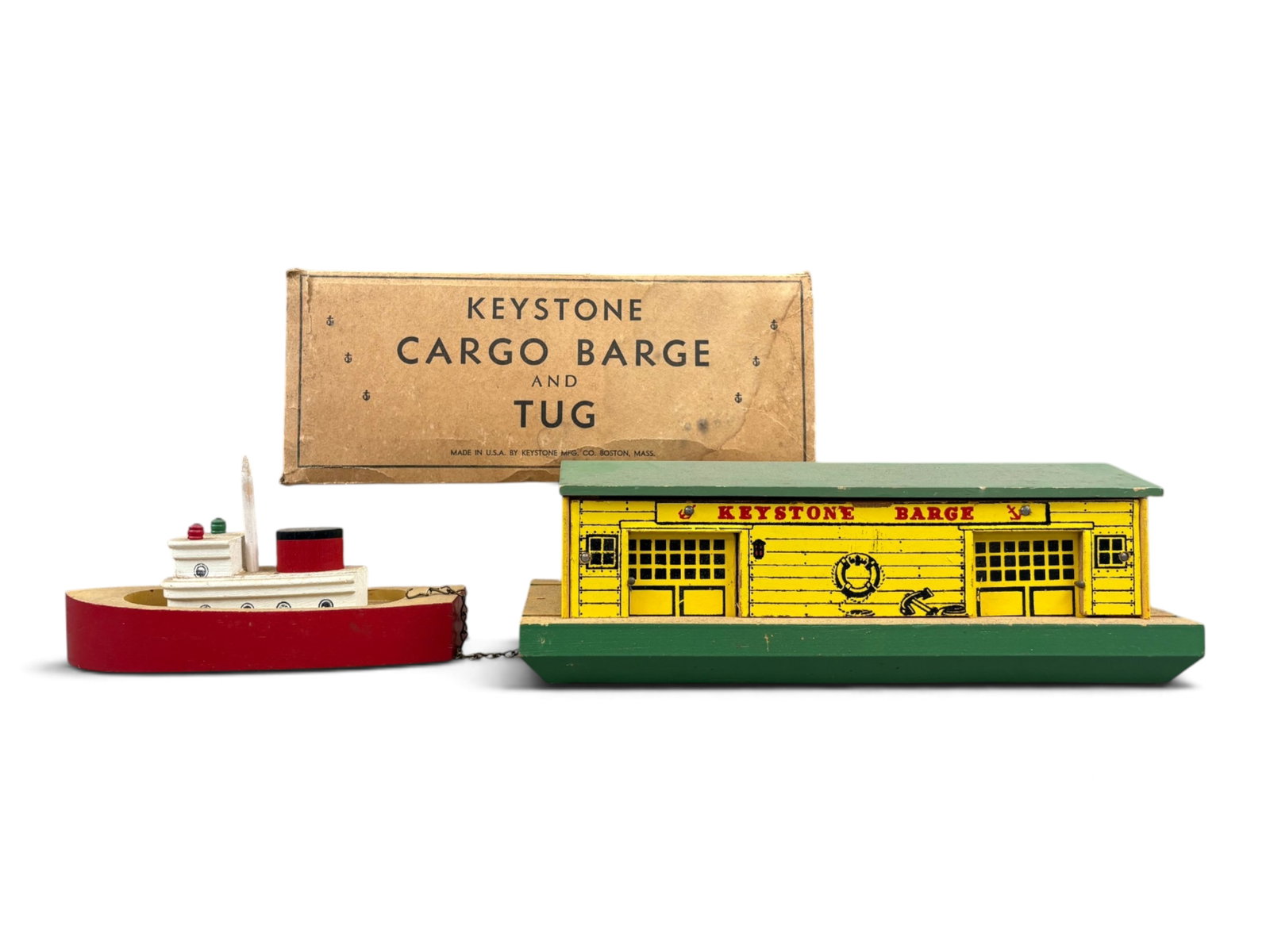 Keystone #967 Cargo Barge & Tug w/Partial Box: Circa 1940's, Keystone #967 Wooden Cargo Barge and Tug Boat. Barge is approx. 11-3/4" x 4-3/4", Tug boat approx. 7-1/2" long. Pieces show light playwear, some surface wear and staining to the roof. Co