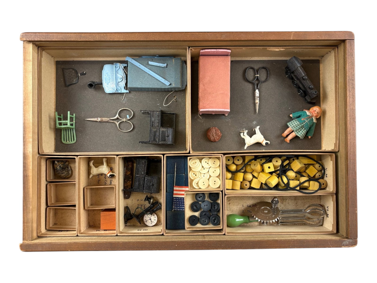 1940s Stanford-Binet Intelligence Kit: Unusual Medical test kit designed to test the Brain Power of a patient. It contains many easily recognizable items, many made by TootsieToy includes beds(1 frame broken), stoves, kitchen implements