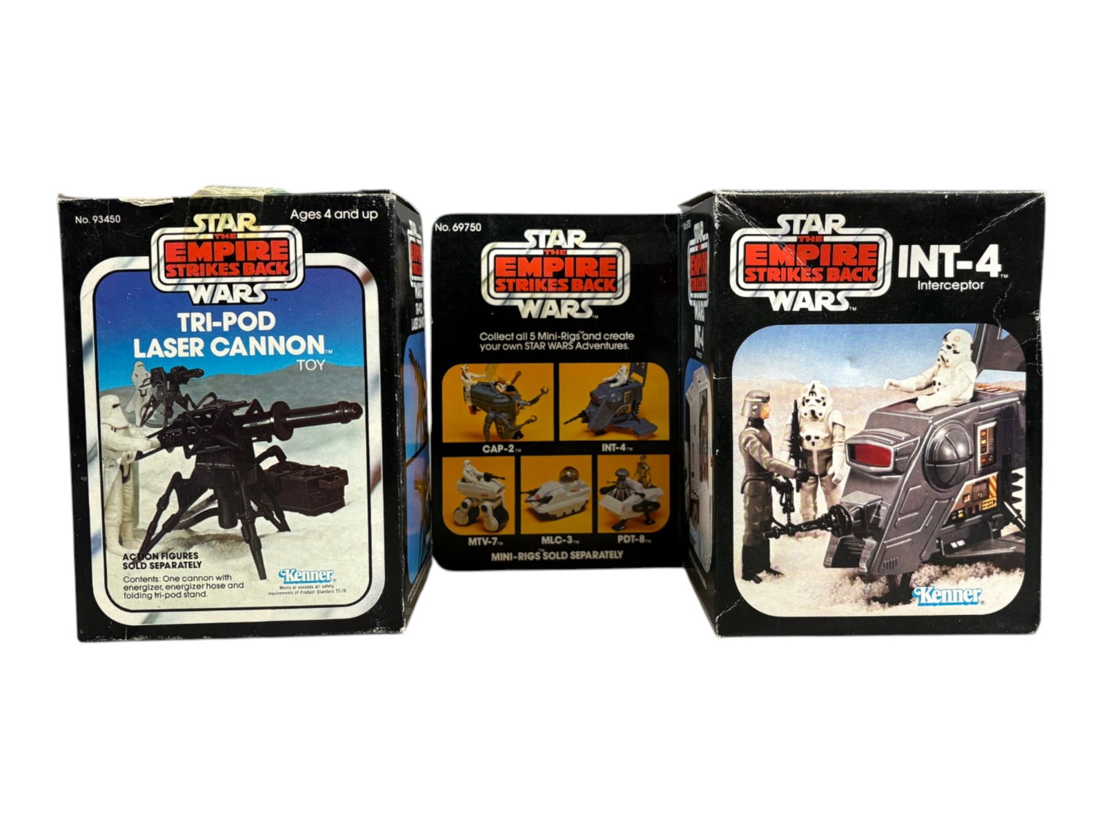 1981/82 Star Wars ESB INT-4 & Laser Cannon, Boxed: 2 pieces. Vintage and Original, Star Wars The Empire Strikes Back "Tri-Pod Laser Cannon" and "INT-4 Interceptor", by Kenner, 1981/82. The tape on the top closure flap of each has dried up and therefor