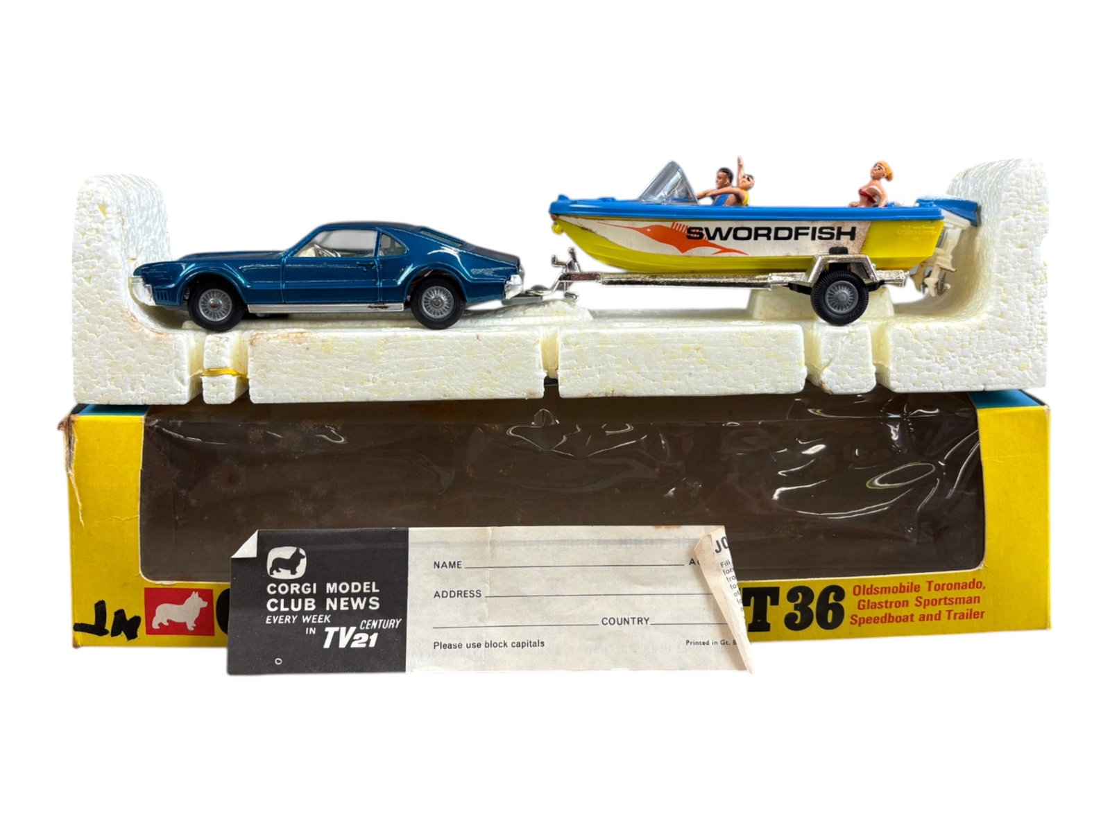 Corgi Toys GS36, Toronado & Speedboat Trailer: Corgi Toys Gift Set 36, includes Oldsmobile Toronado, Glastron Sportsman Speedboat and Trailer, along with (3) plastic figures (loose in boat). Pieces each show light playwear. Housed in the original
