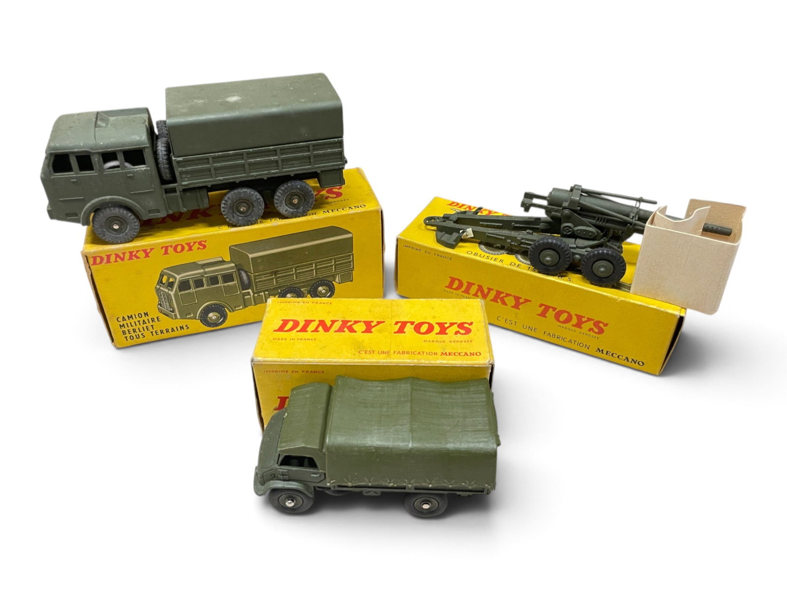3 Boxed Dinky French Military Vehicles: Includes an FR818Camion All-terrain Vehicle; FR80E 155mm Gun Trailer with insert; 821 Unimog Covered Truck. All appear like new with nice boxes. Shipping: Weiss Auctions offers full-service, in-house
