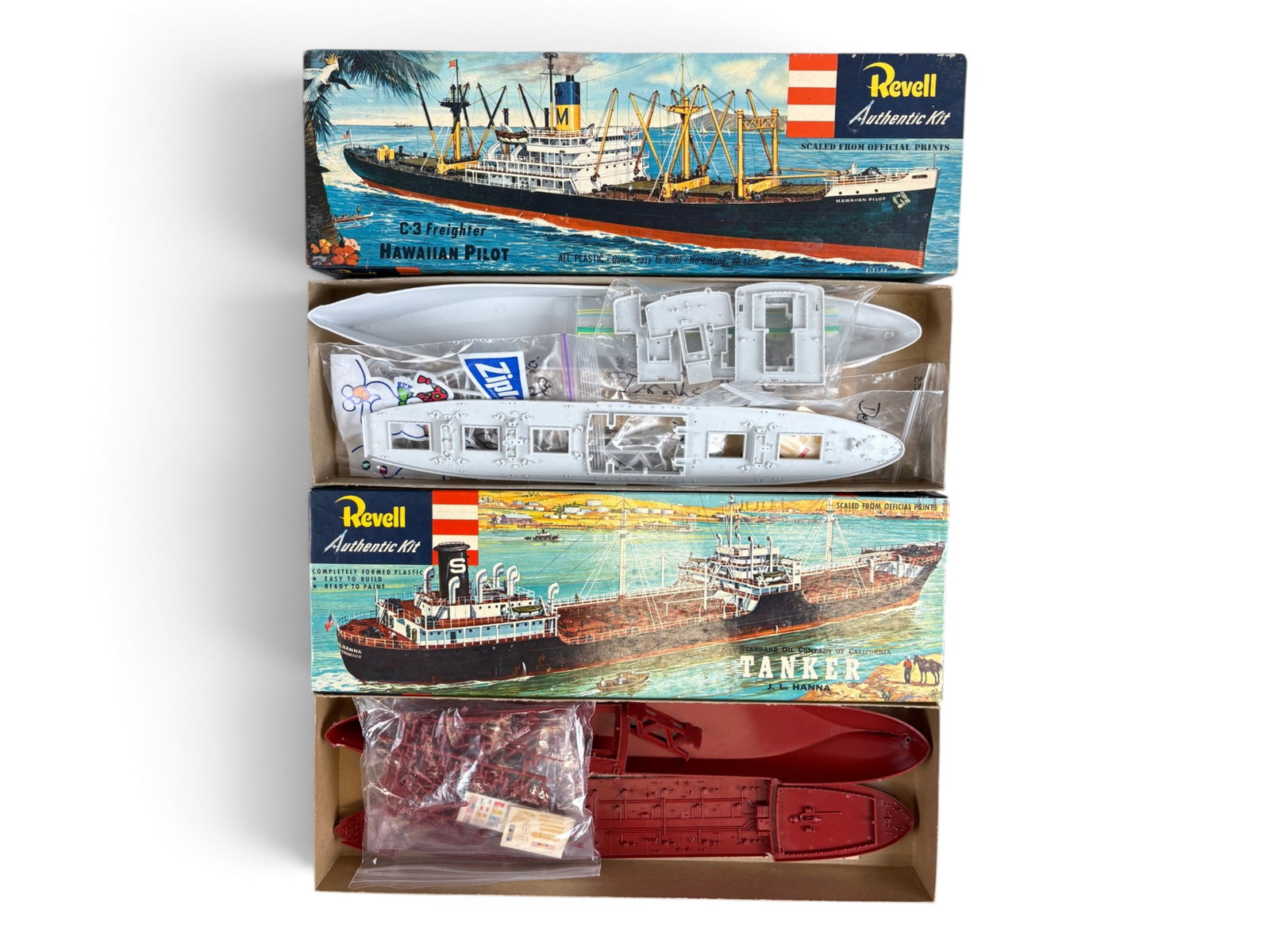 2 Revell 1955 Ship Model Kits: Includes H315:169 Hawaiian Pilot C-3 freighter, parts consignor bagged and collated to be complete with instructions; H322:169 LJ Hanna Oil Tanker, parts sealed in bag with instructions. Both have