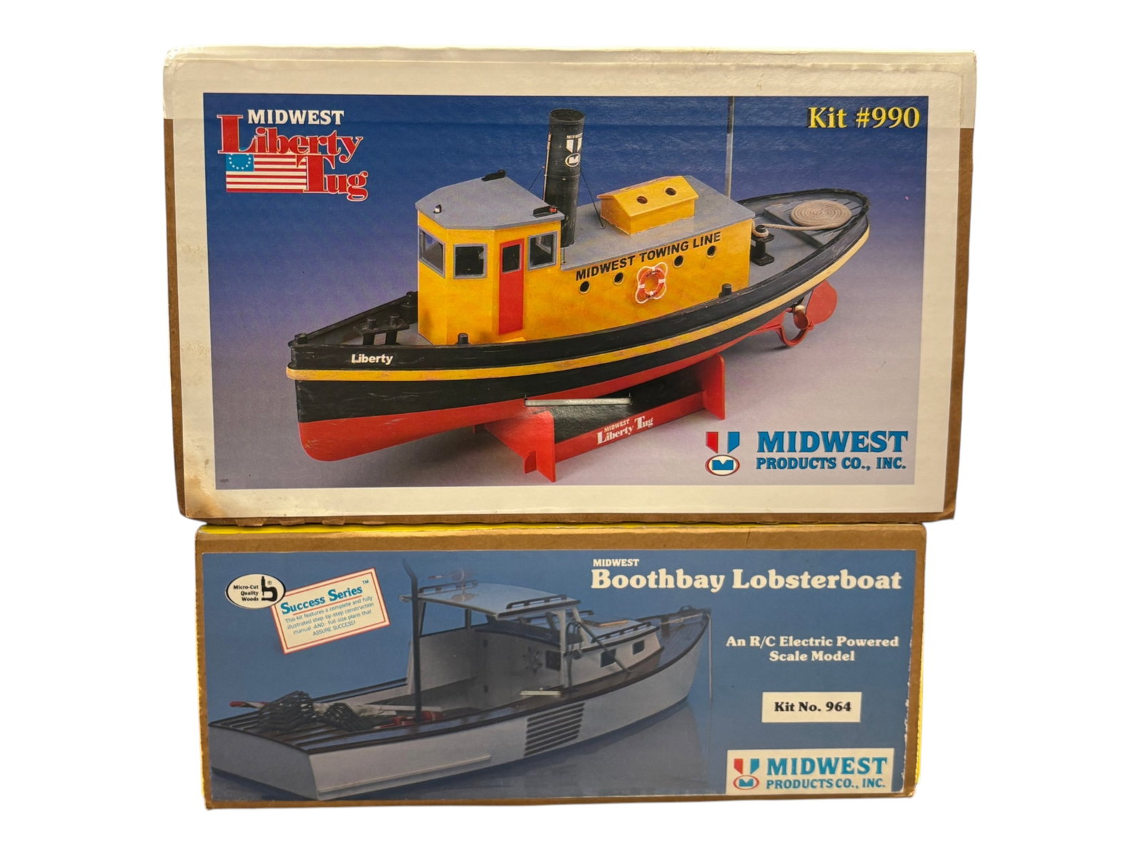 2 Large Midwest RC Wood Boat Model Kits: Includes a 990 Liberty Tug, 25 inch when built. Can run live steam or electric; 964 Booth Bay Lobster boat, 30 inch long when built, motor running gear included. All appear, new in boxes with plans.