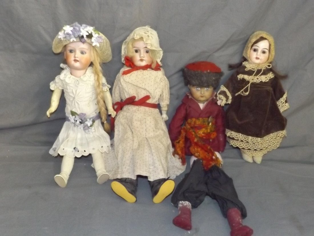 Bisque Doll Lot of Four. (1 of 3)
