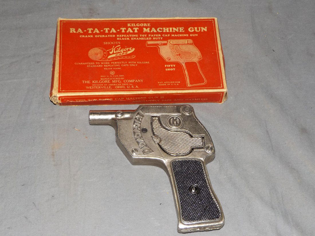 Kilgore Mint in Box.: Ra-Ta-Ta-Tat Machine Gun. This lot is being sold on behalf of the Nassau County Public Administrators Office from the Estate of Robert Lee.