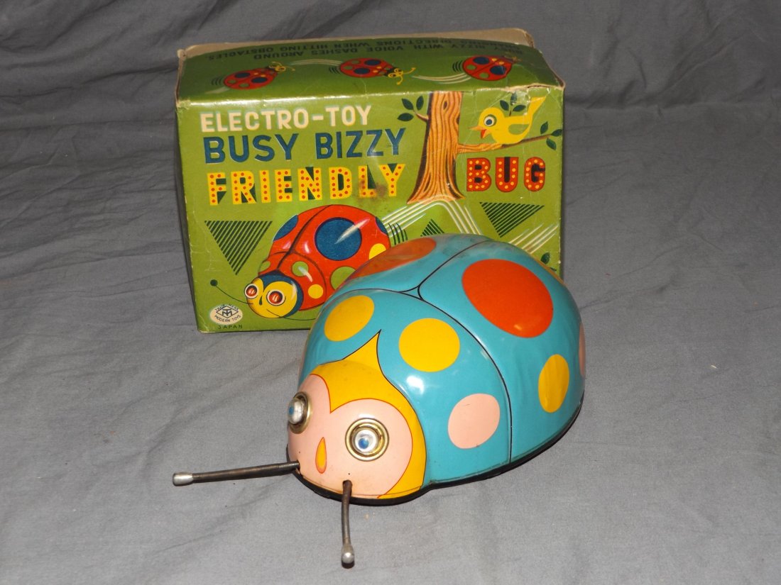 Boxed Battery Operated Busy Bizzy Friendly Bug: Modern Toys, made in Japan. Battery operated toy. Untested, however battery compartment is clean. Toy has light playwear with some scuffs and scratches. Original box shows some wear with creases, tear
