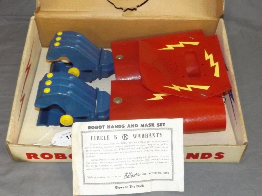 Boxed Kilgore Robot Hands Set: Vintage, Robot Hands set by Kilgore, no. 610. Includes vinyl robot face mask and working plastic robot hands with original plastic cuffs. Set comes in the original box which shows some edge and corner