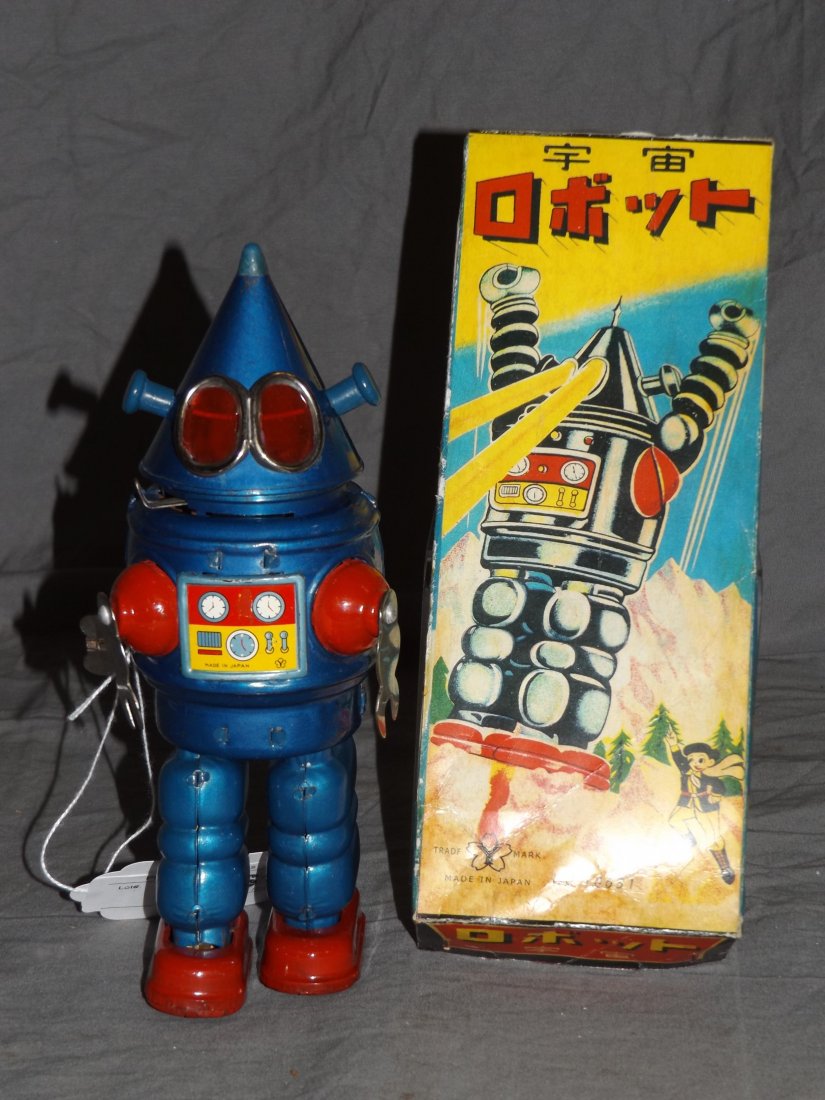 Rare. Conehead Robot.: Robot is in working order, with some minor paint touch ups noted. Robot comes with box cover that appears to be a copy. Nice Robot to add to any collection.