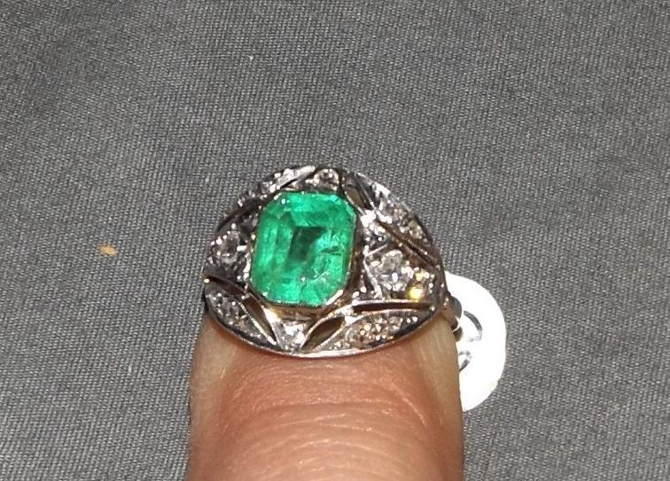 14 Kt White Gold diamond and Emerald Ring. (1 of 3)