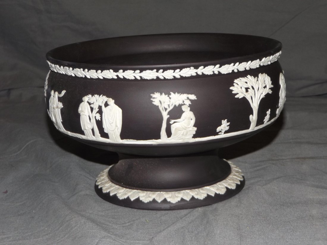 Black Wedgwood Bowl: 8" Diameter with two small drops in bowl of possibly gum or sticky substance.