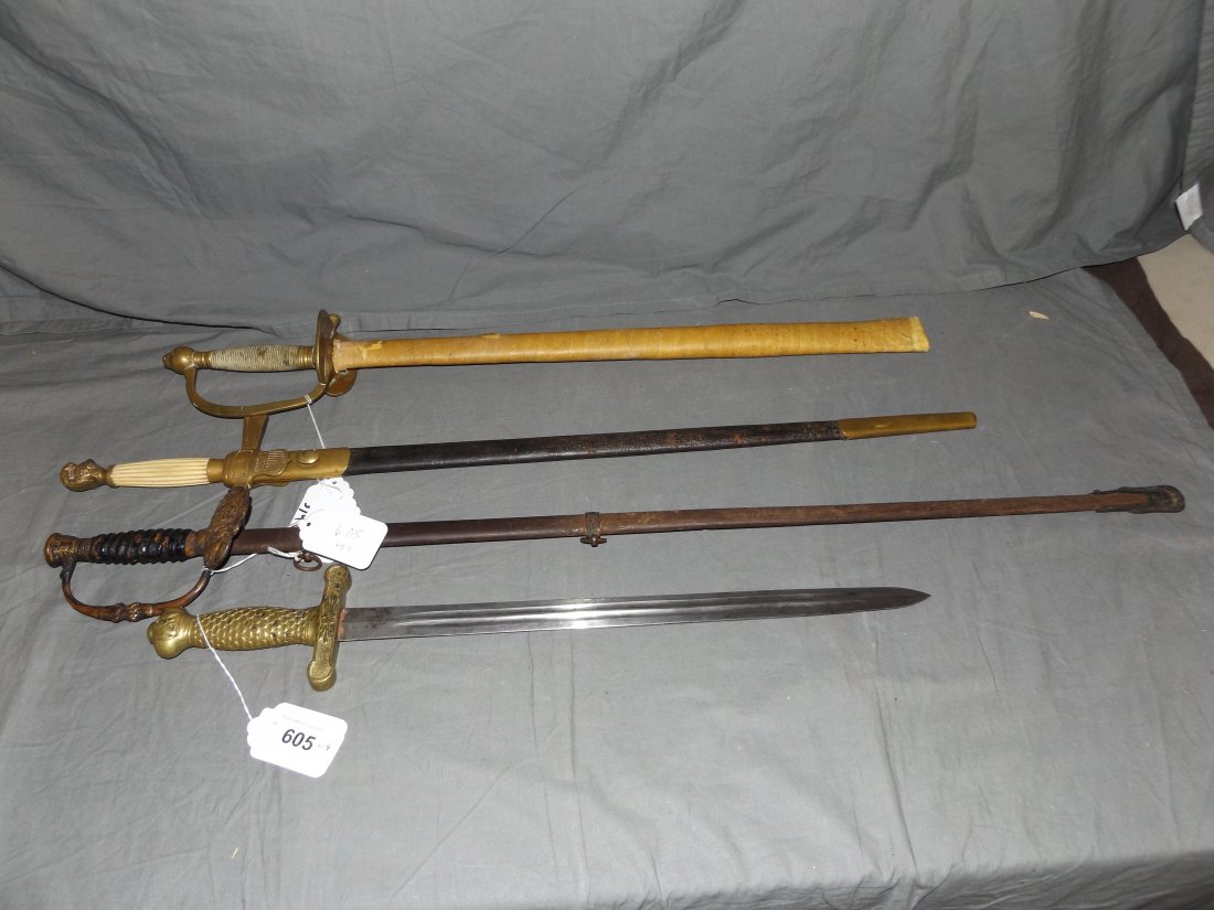 Lot of Four Swords.: Lot includes Horstmann U.S.M.C., 1809 Sword and Scabbard U.S.A., and two others. this lot is being sold on behalf of the Nassau County Public Administrator from the Estate of Robert Lee.