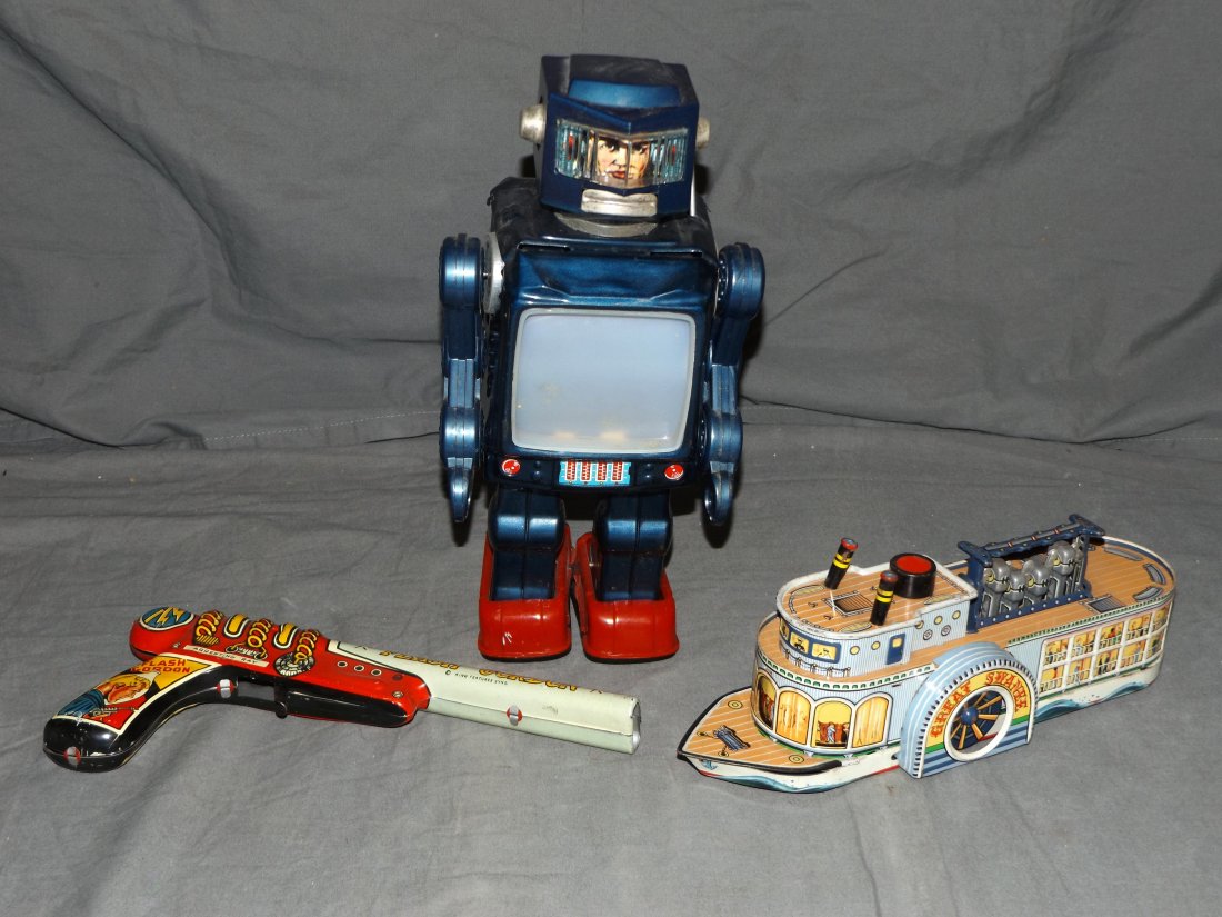 Lot of Three Tin Toys.: Swanee River Boat Friction Japan, T.V. Robot Battery Op and Flash Gordon Pistol