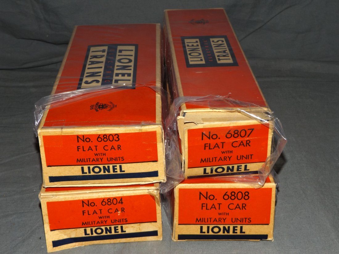 Lionel Lot of 4 Flat Cars w/Military Loads (1 of 3)