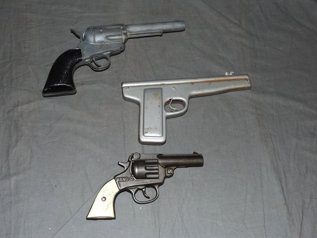 Lot of 3 Vintage Toy Guns: Includes 45 Smoker, Bang-O cap gun, and Aeromatic Glider Launching Pistol. Each shows some wear. Examine