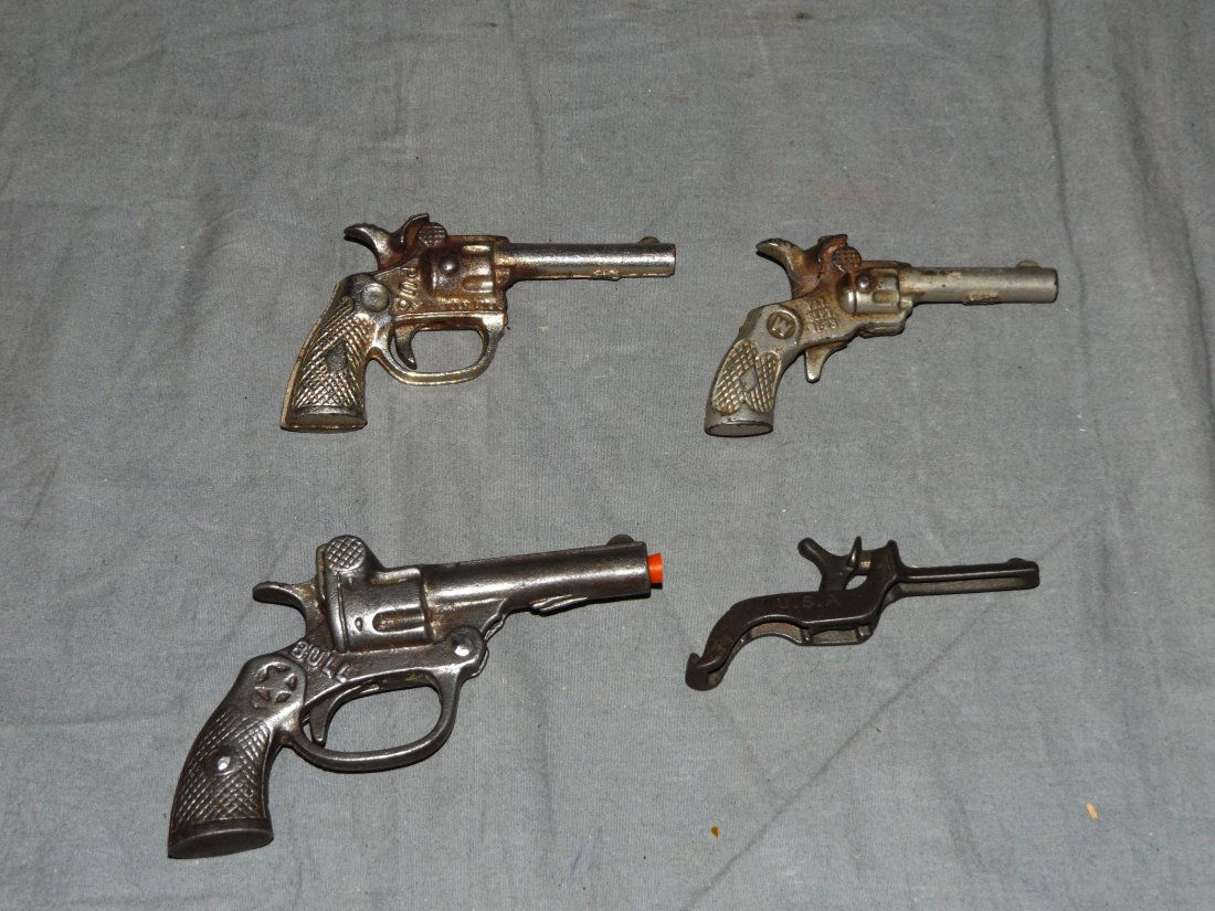 Lot of 4 Vintage Cast Iron Toy Cap Guns (1 of 2)