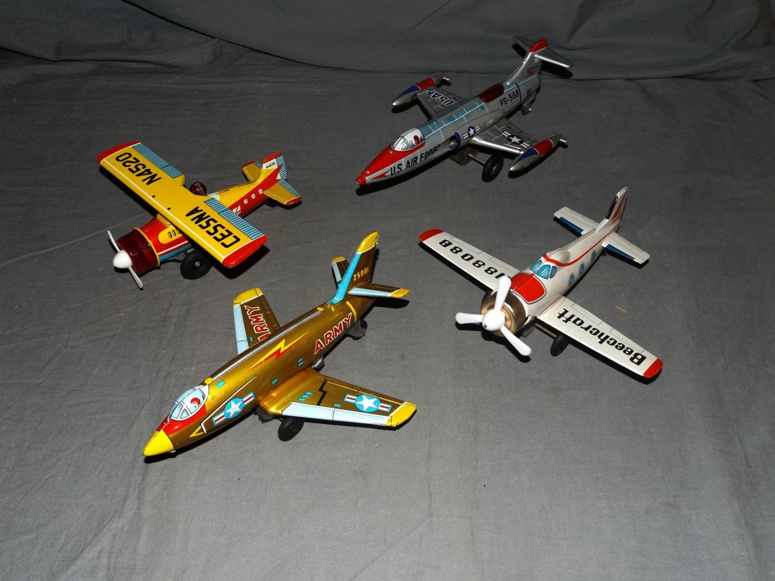 Lot of 4 Tin Litho Airplane Friction Toys (1 of 2)